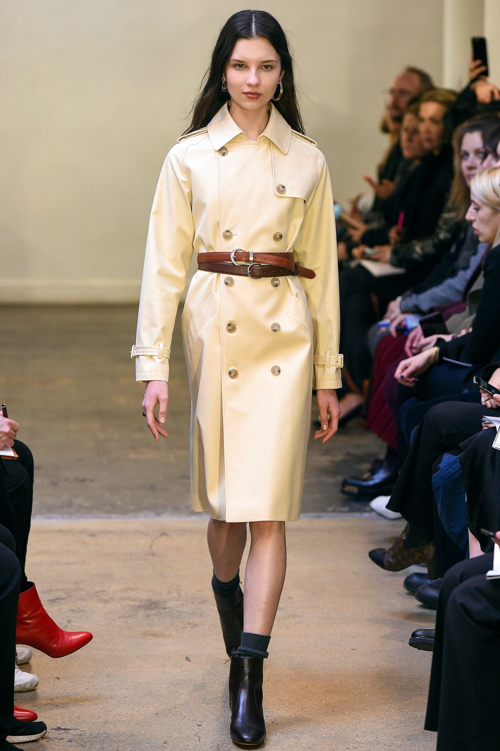 beige vinyl belted trench coat