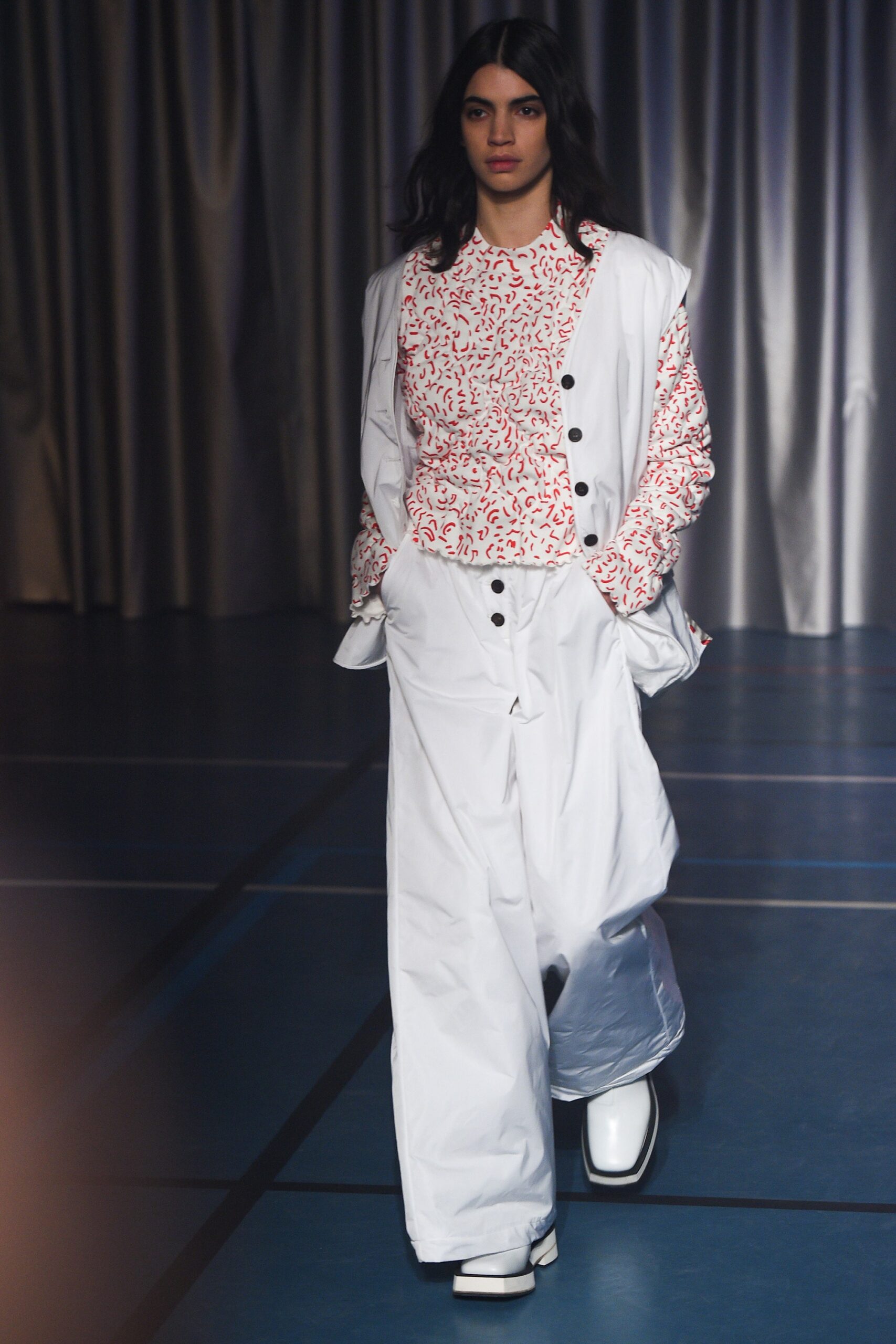 white relaxed pants with printed top