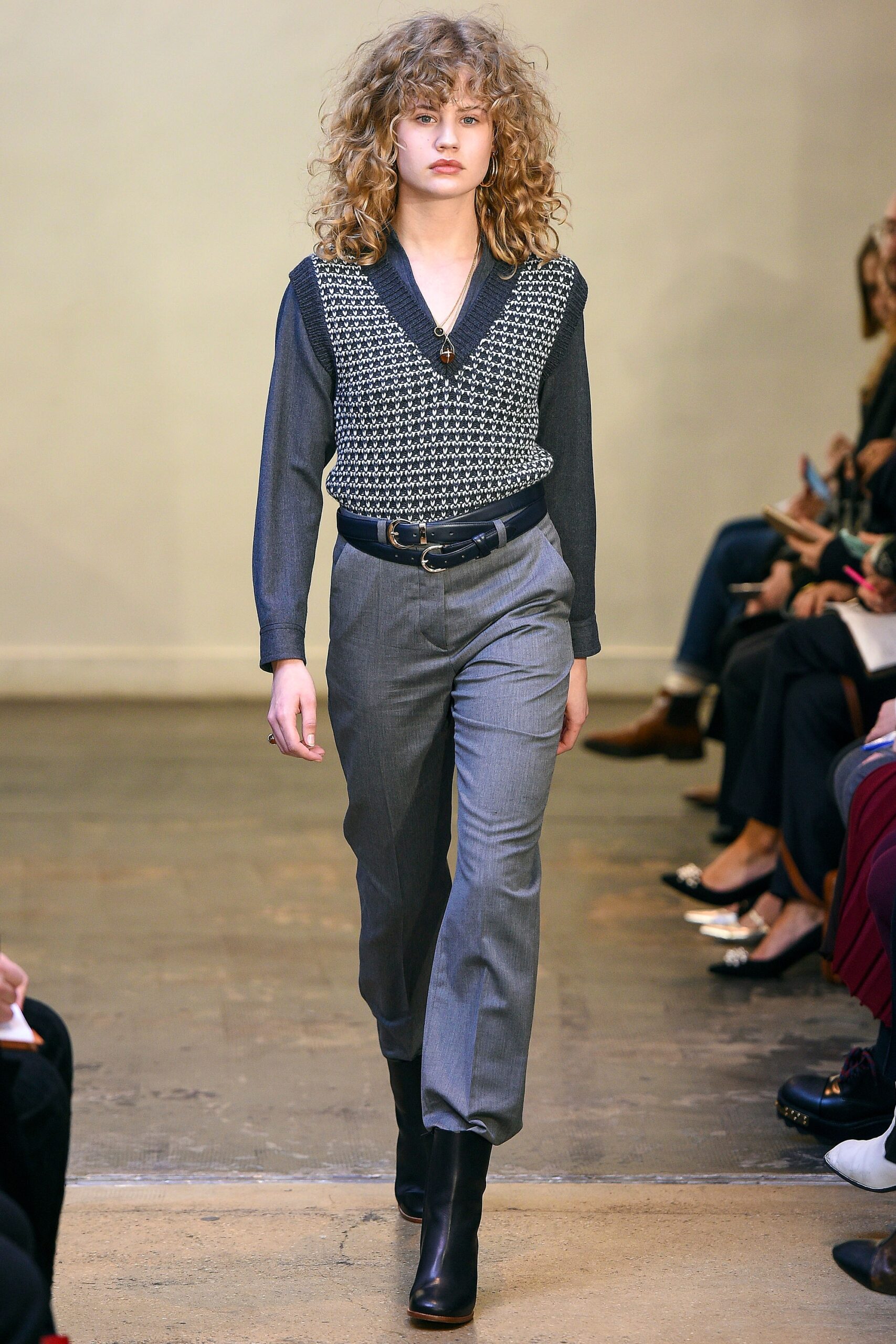fitted black and gray top with tailored pants