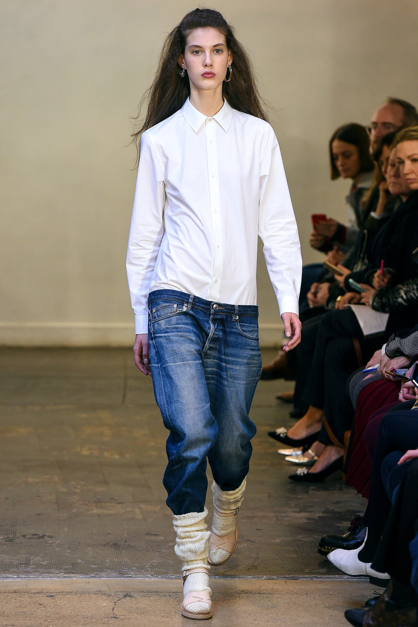 white fitted shirt with relaxed jeans