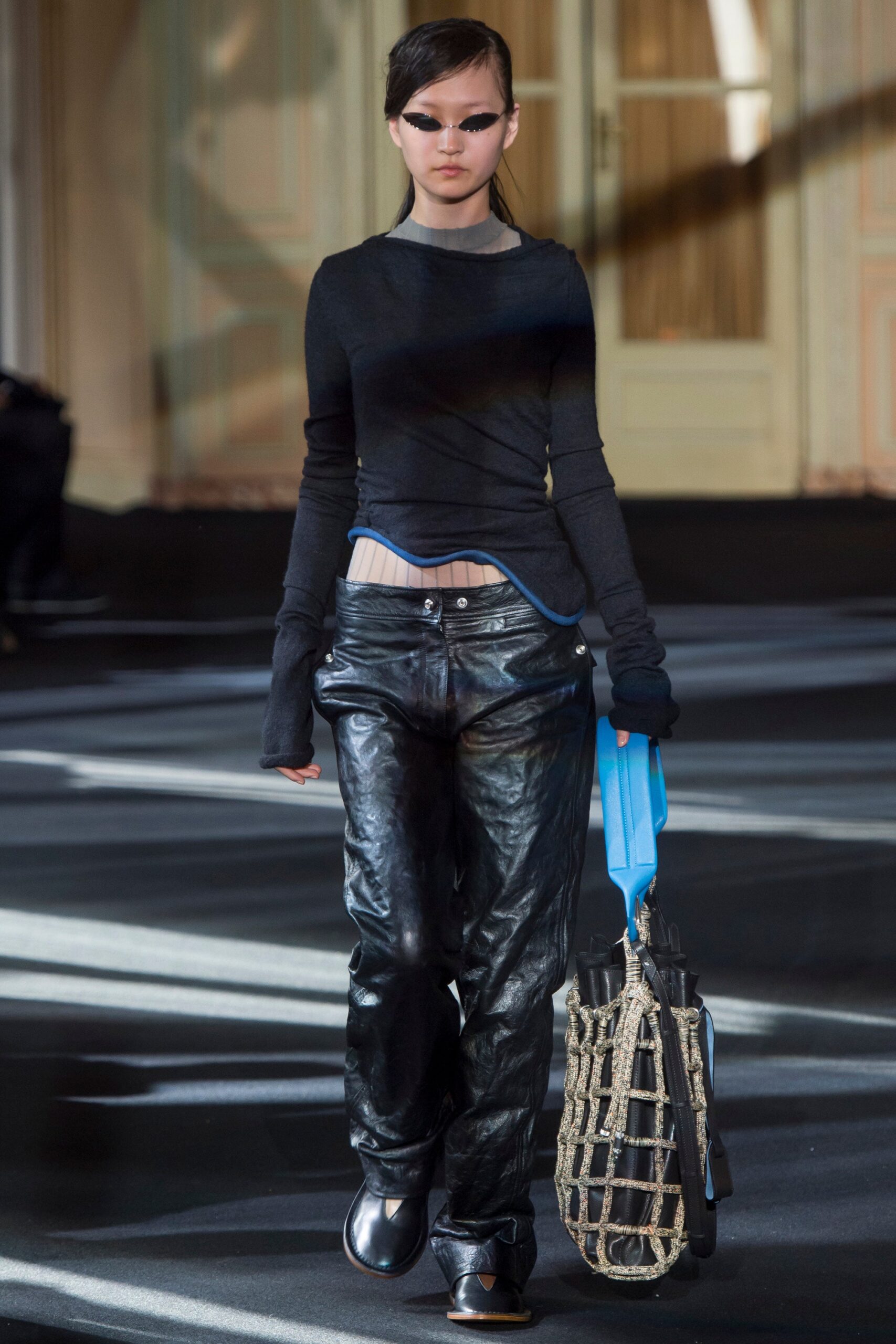 black fitted top and relaxed pants