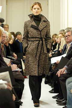 brown wool belted coat with black pants