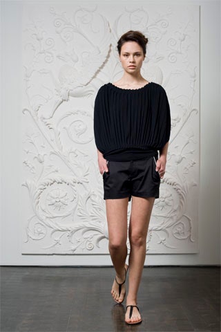 black silk relaxed top and fitted shorts