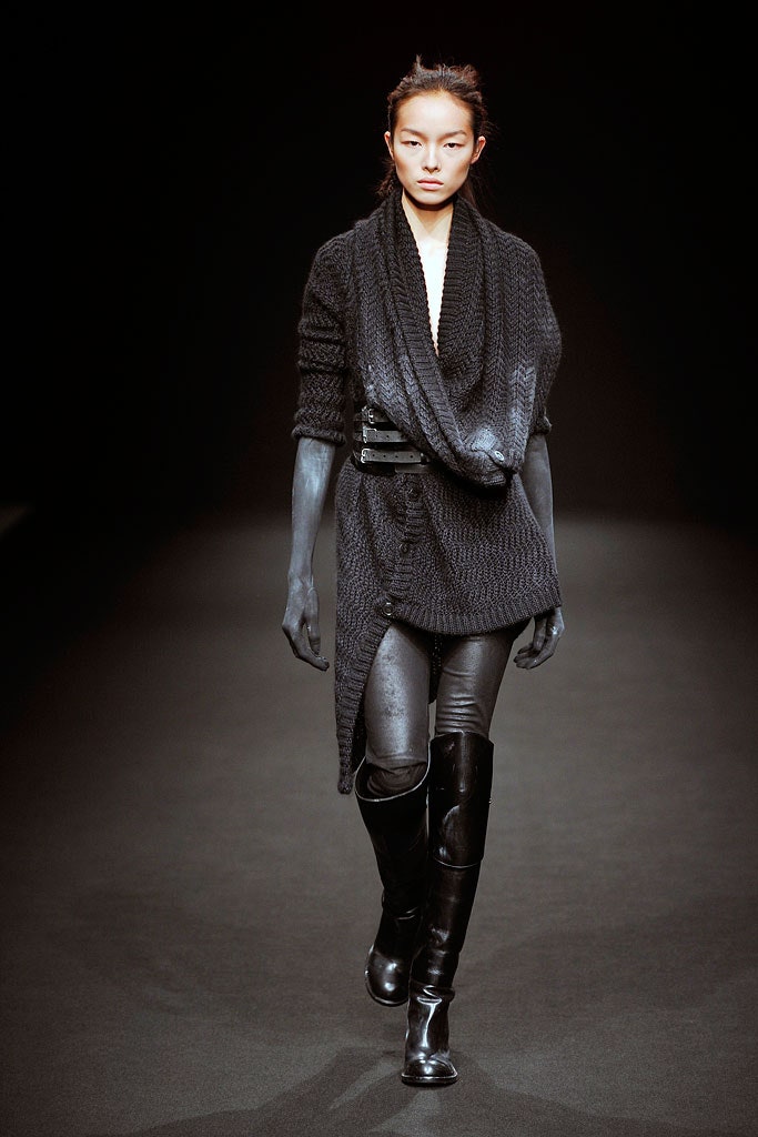 black relaxed sweater with leather pants