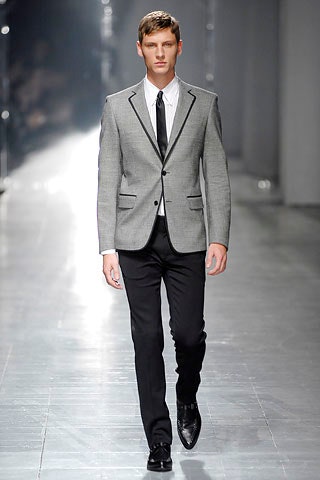 gray tailored blazer with black pants