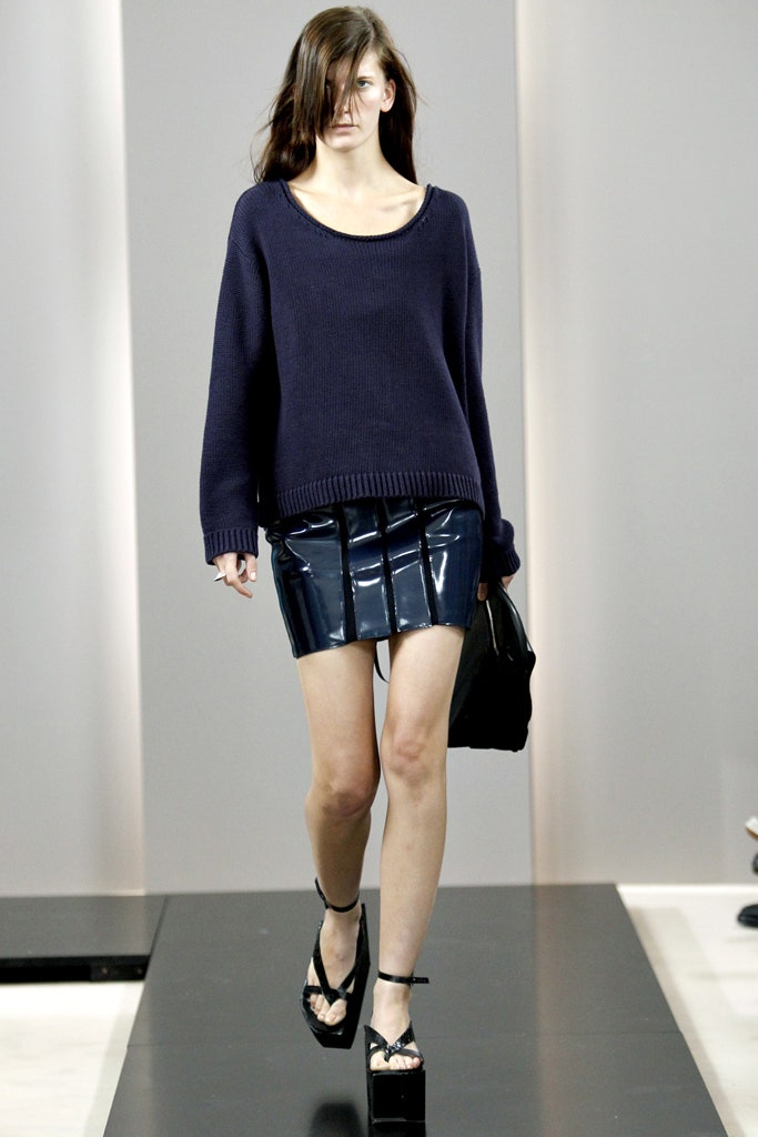 blue oversized sweater with black vinyl skirt