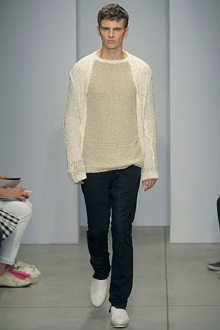 beige relaxed sweater with black pants
