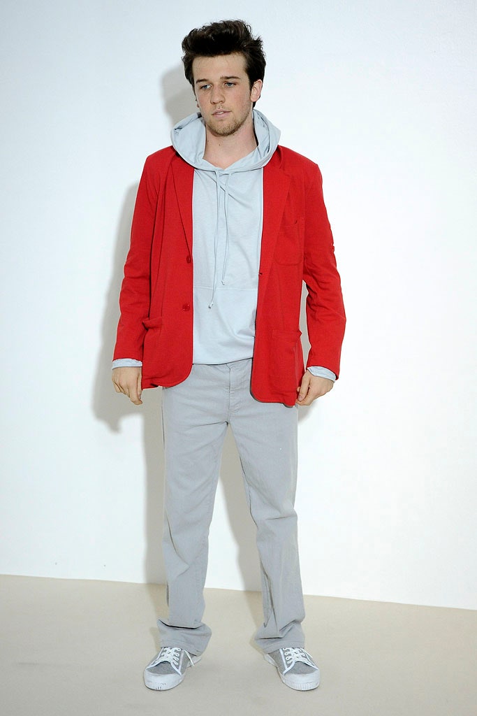 red tailored blazer with gray hoodie