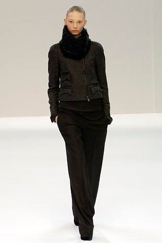 black wool long-sleeve collared fitted zippered pockets jacket
