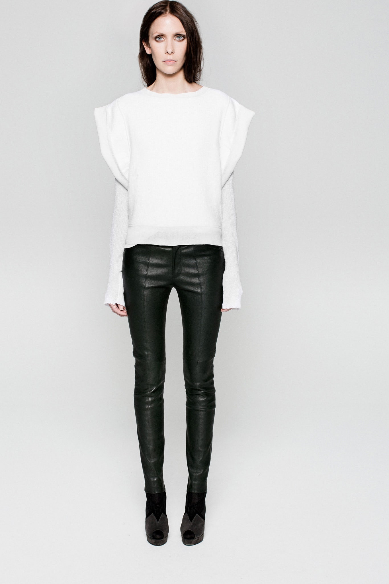 white cotton long-sleeve collared fitted pleated top