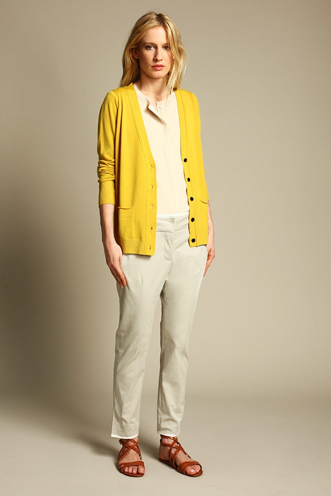 yellow cardigan with beige pants