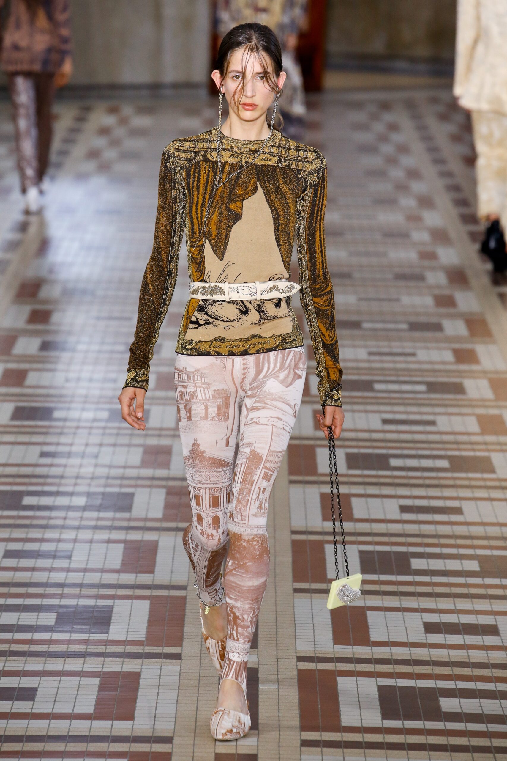printed brown top with pink pants
