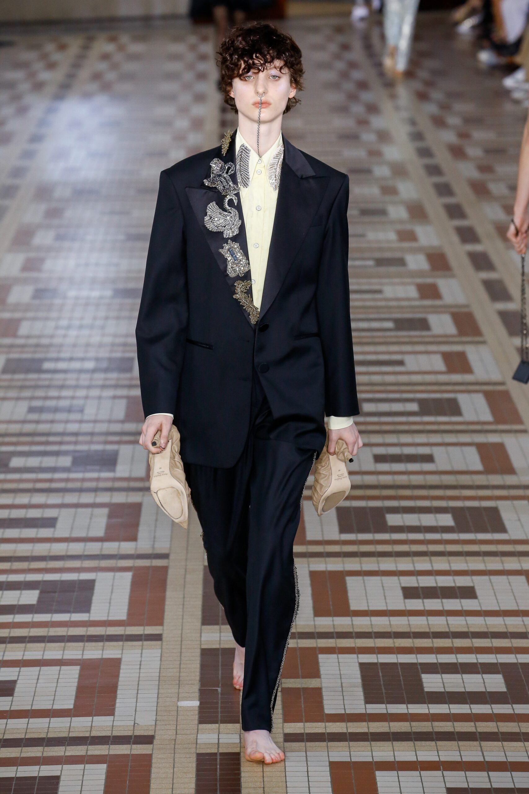black tailored suit with ivory shirt