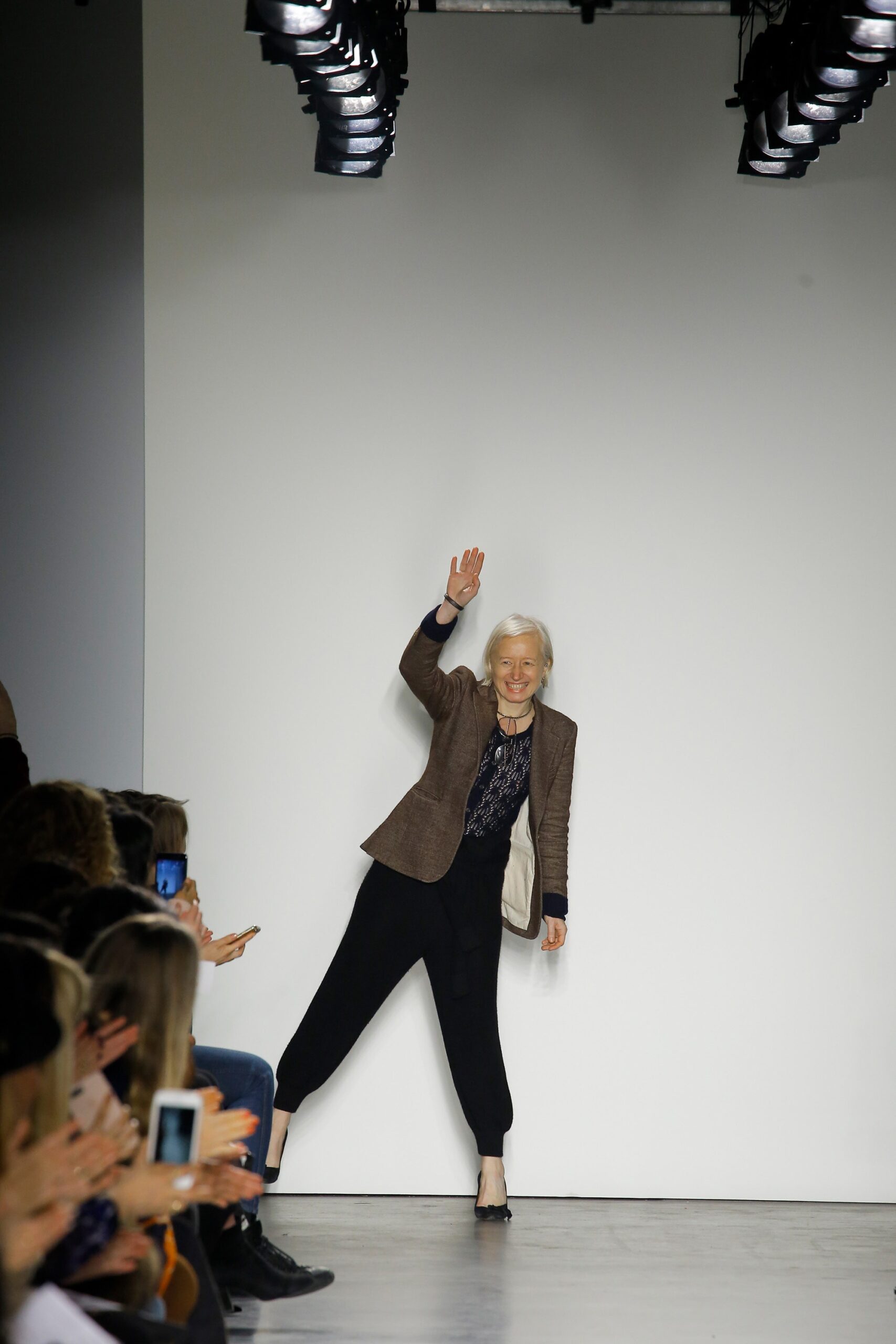 brown tweed tailored blazer with black pants