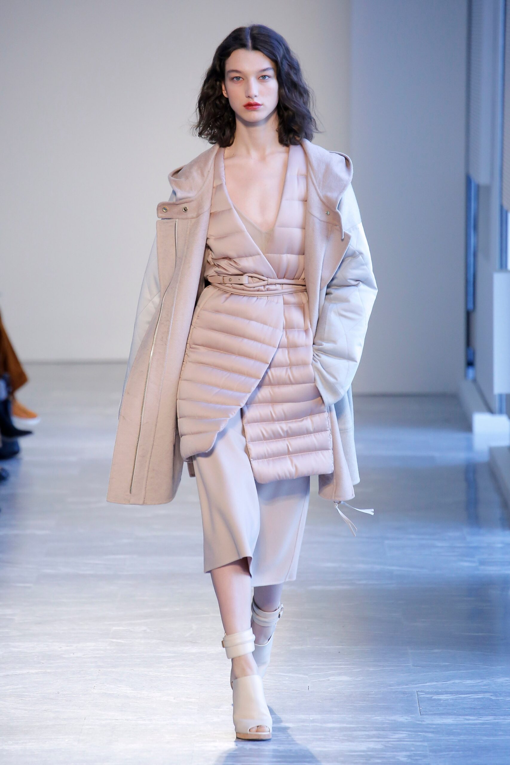 beige relaxed coat and fitted dress