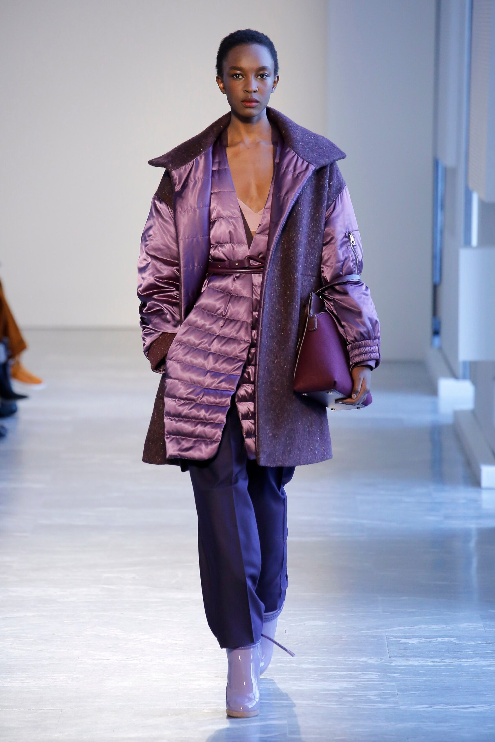 purple layered coat with fitted pants