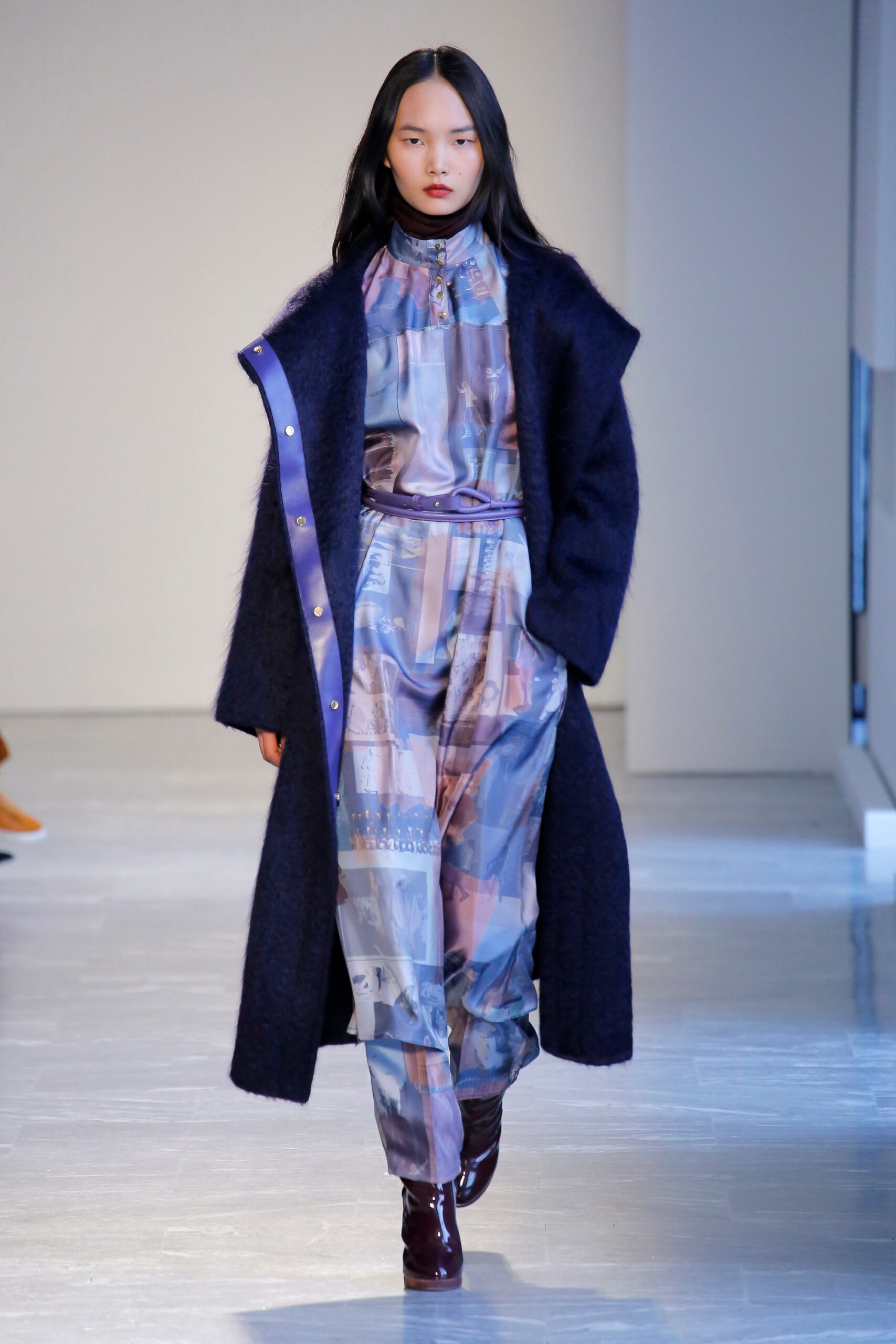 black wool coat and multi jumpsuit