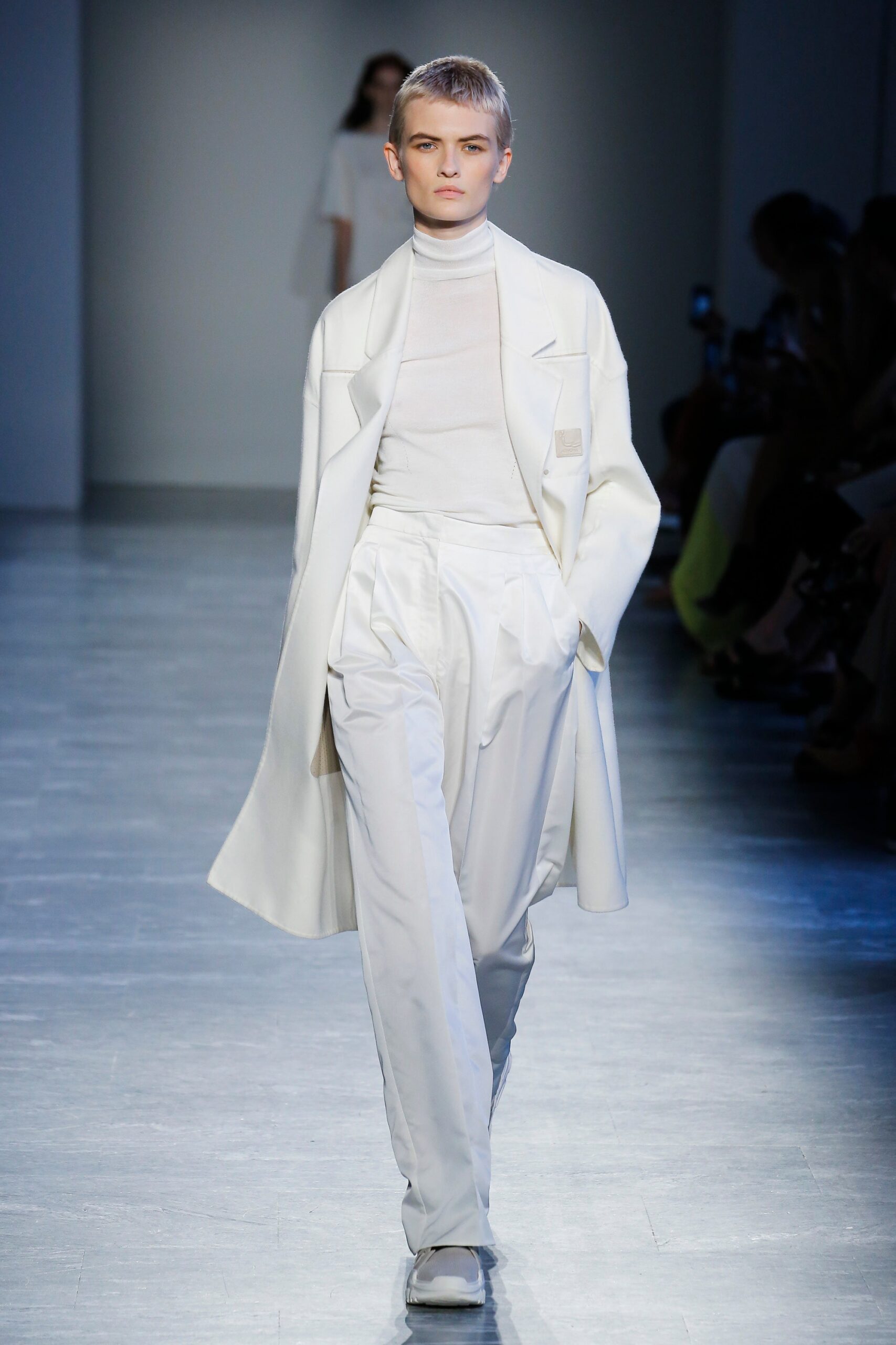white relaxed coat and fitted top