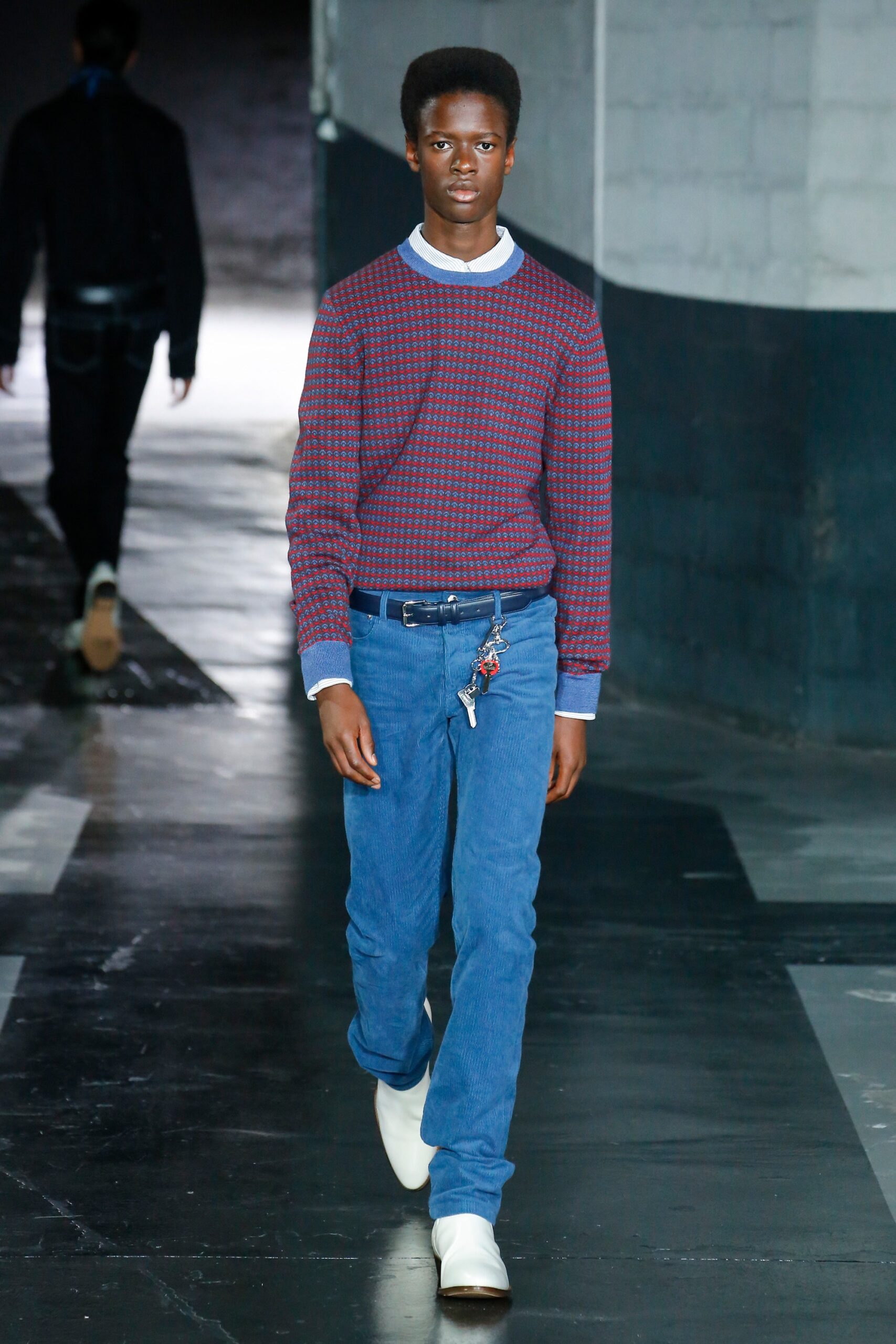 red and blue checked sweater with denim pants