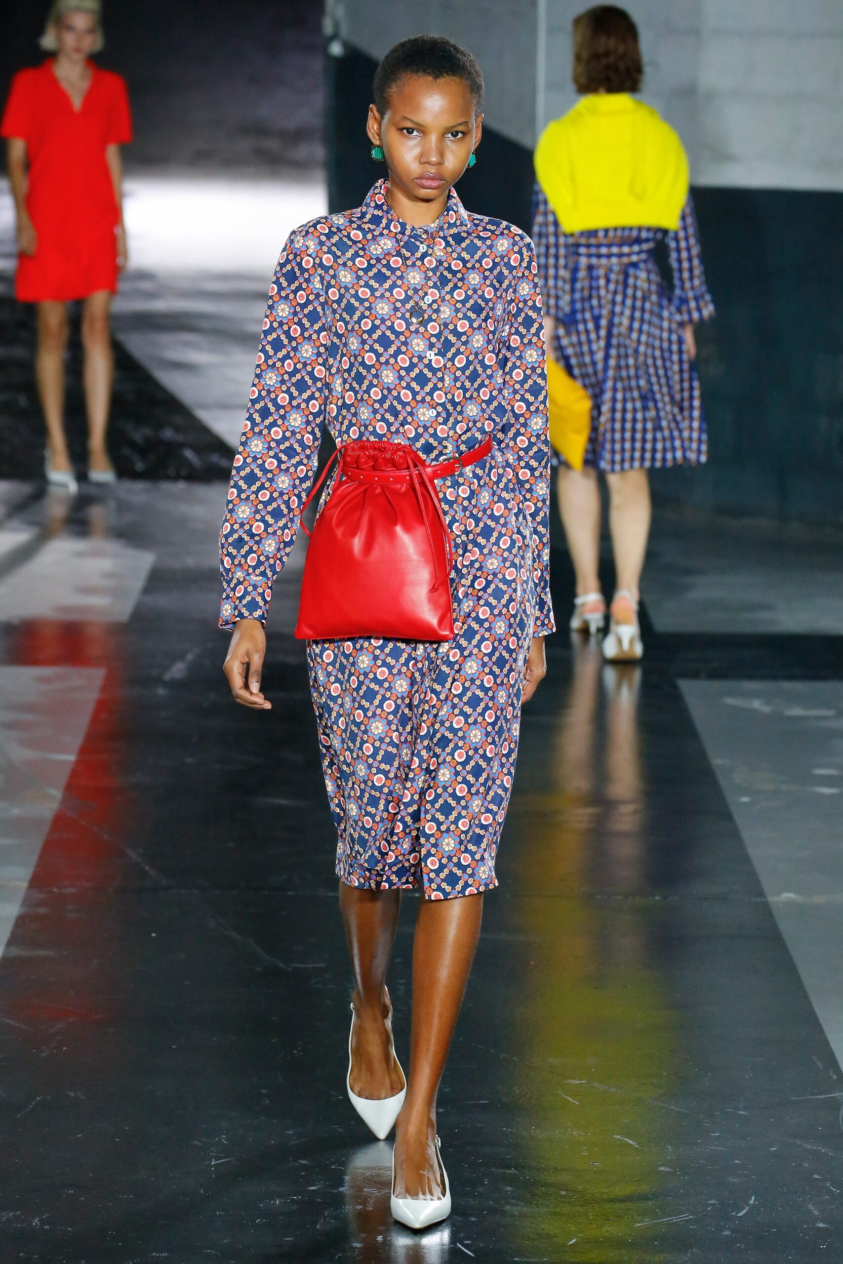 blue printed midi dress with red bag