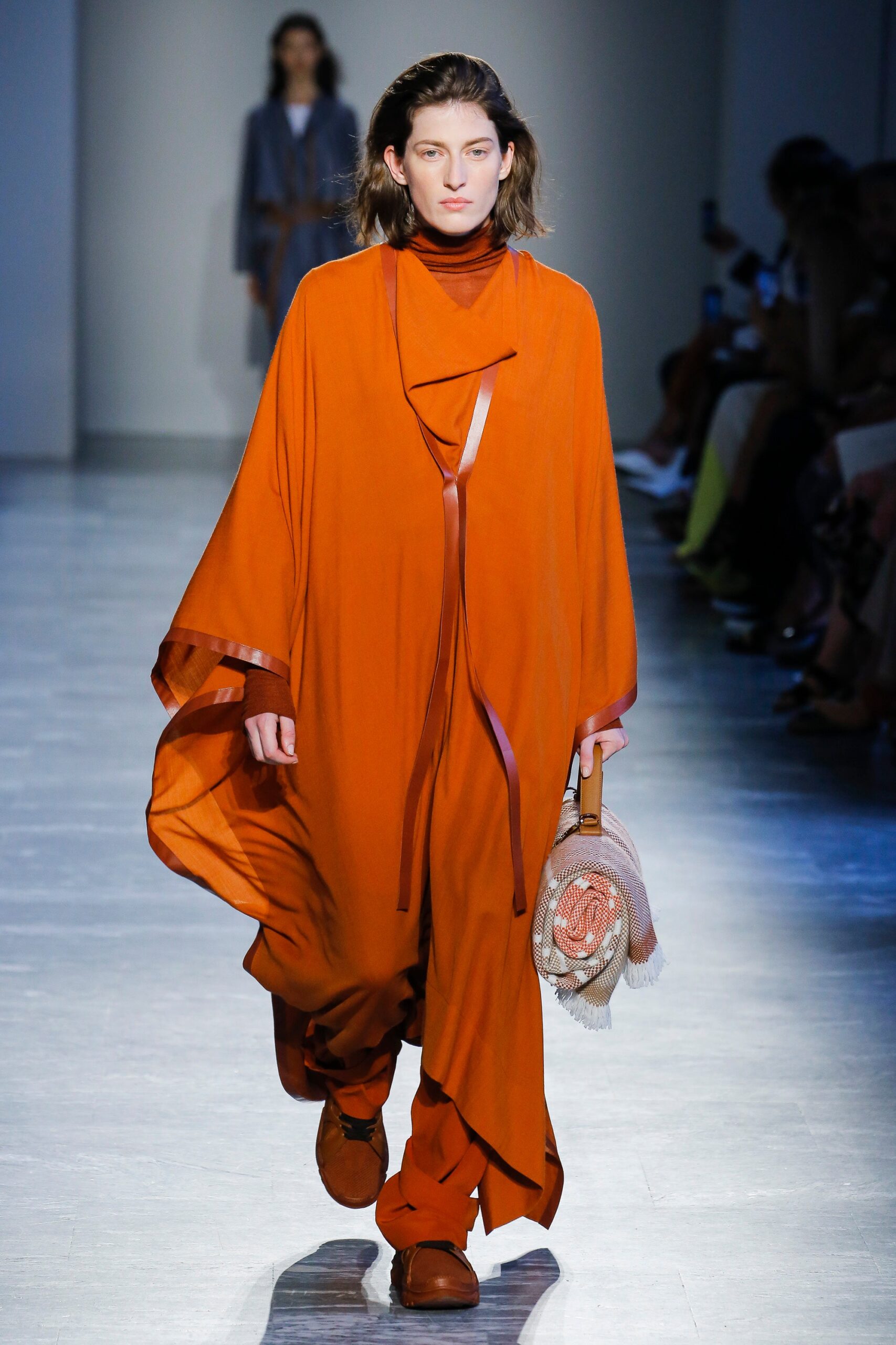 orange silk long-sleeve high-neck relaxed draped flowing jumpsuit