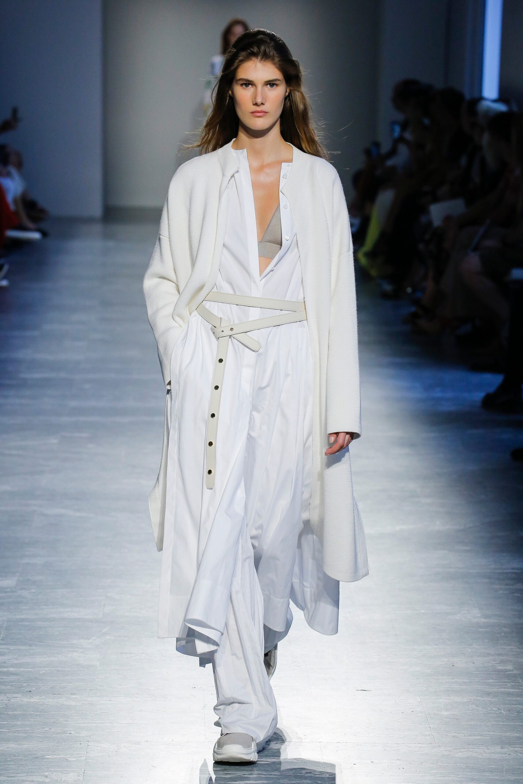 white relaxed coat and fitted dress