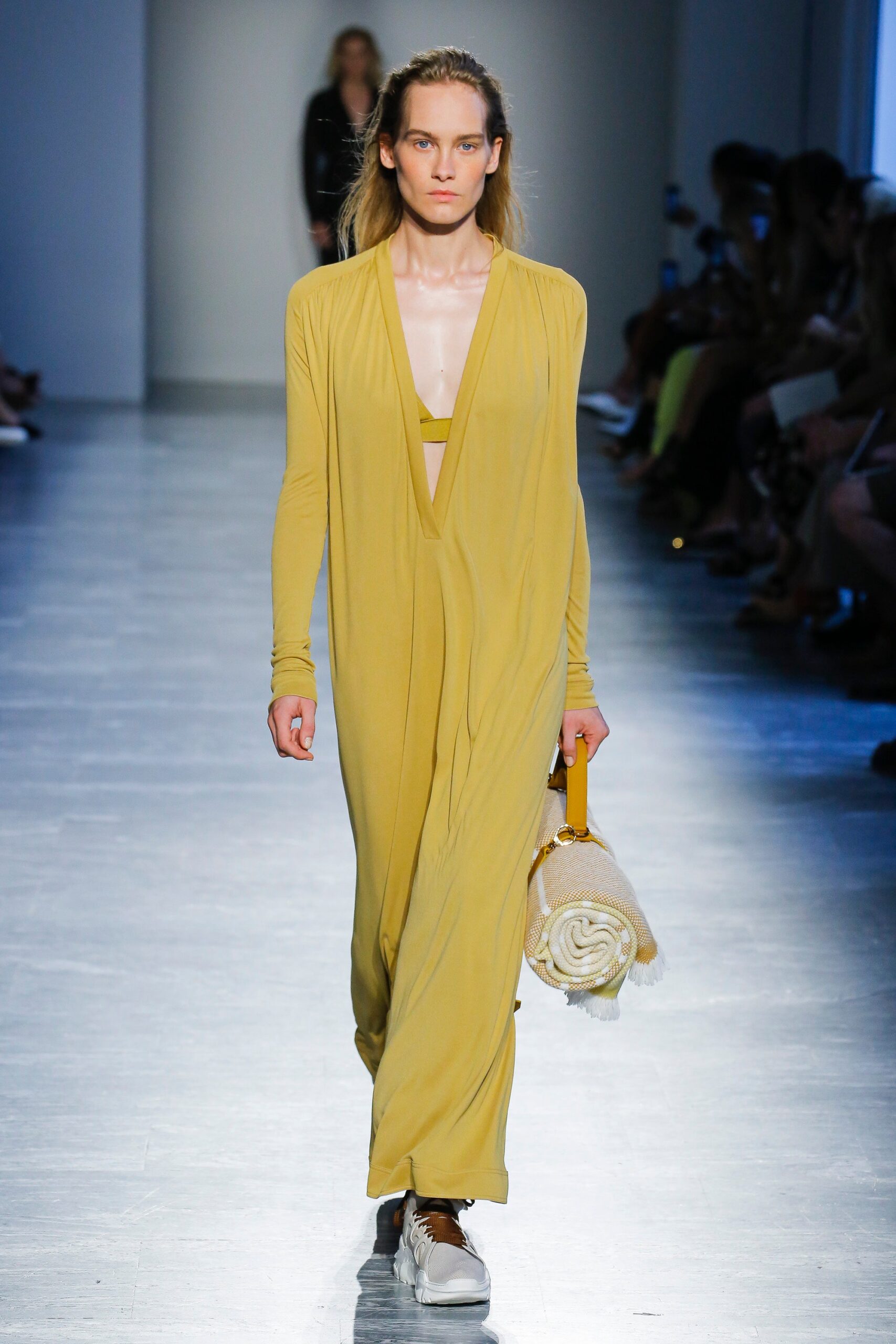 yellow relaxed jumpsuit with bag