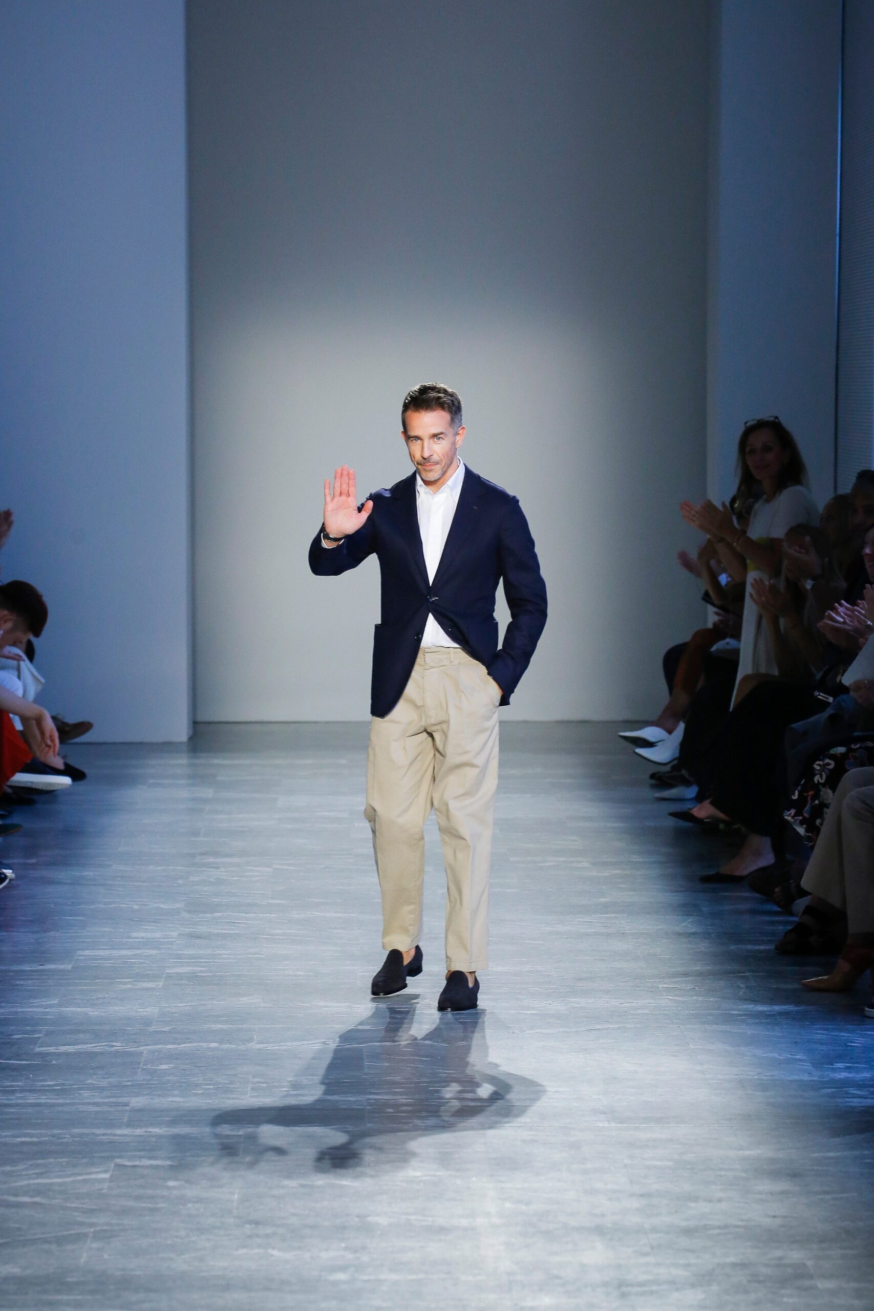 navy blazer and beige pants
