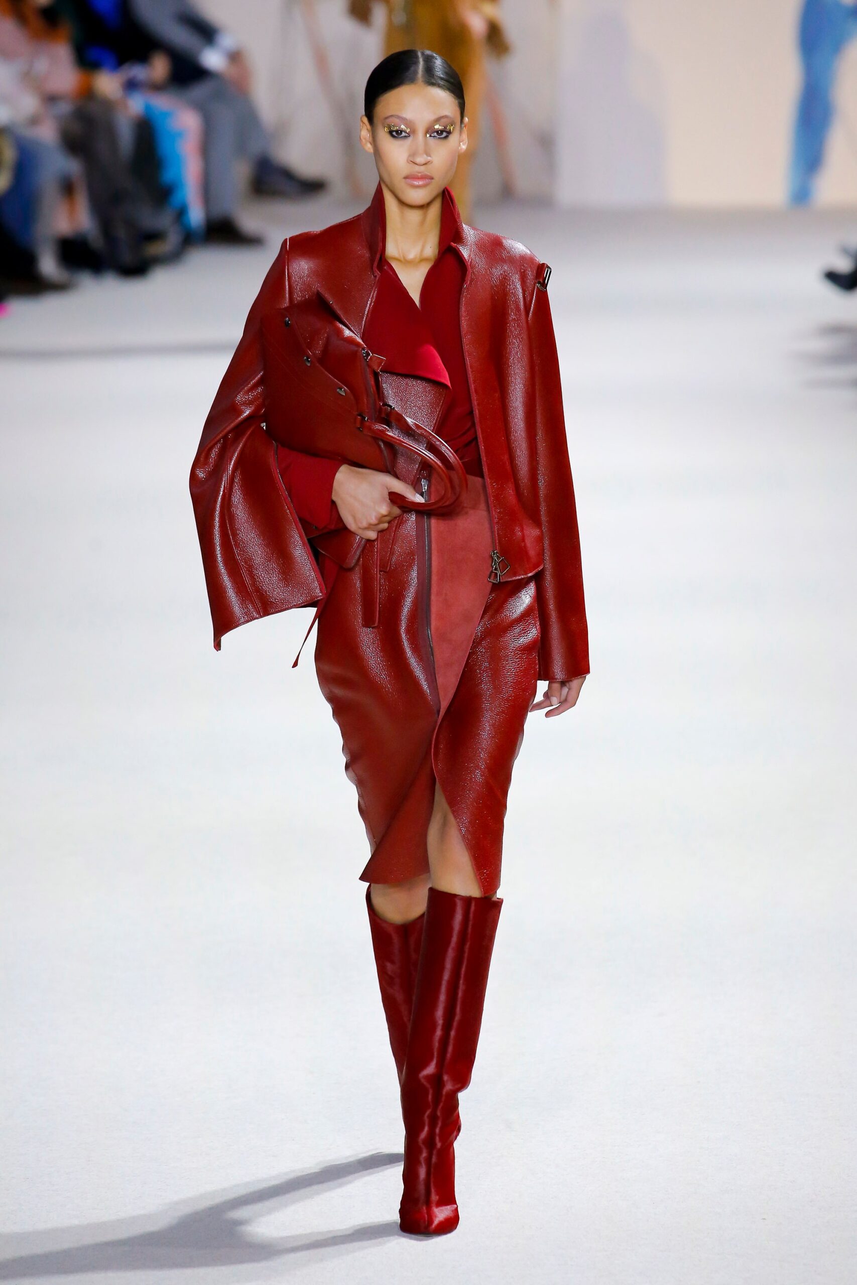 red leather long-sleeve v-neck fitted draped midi dress
