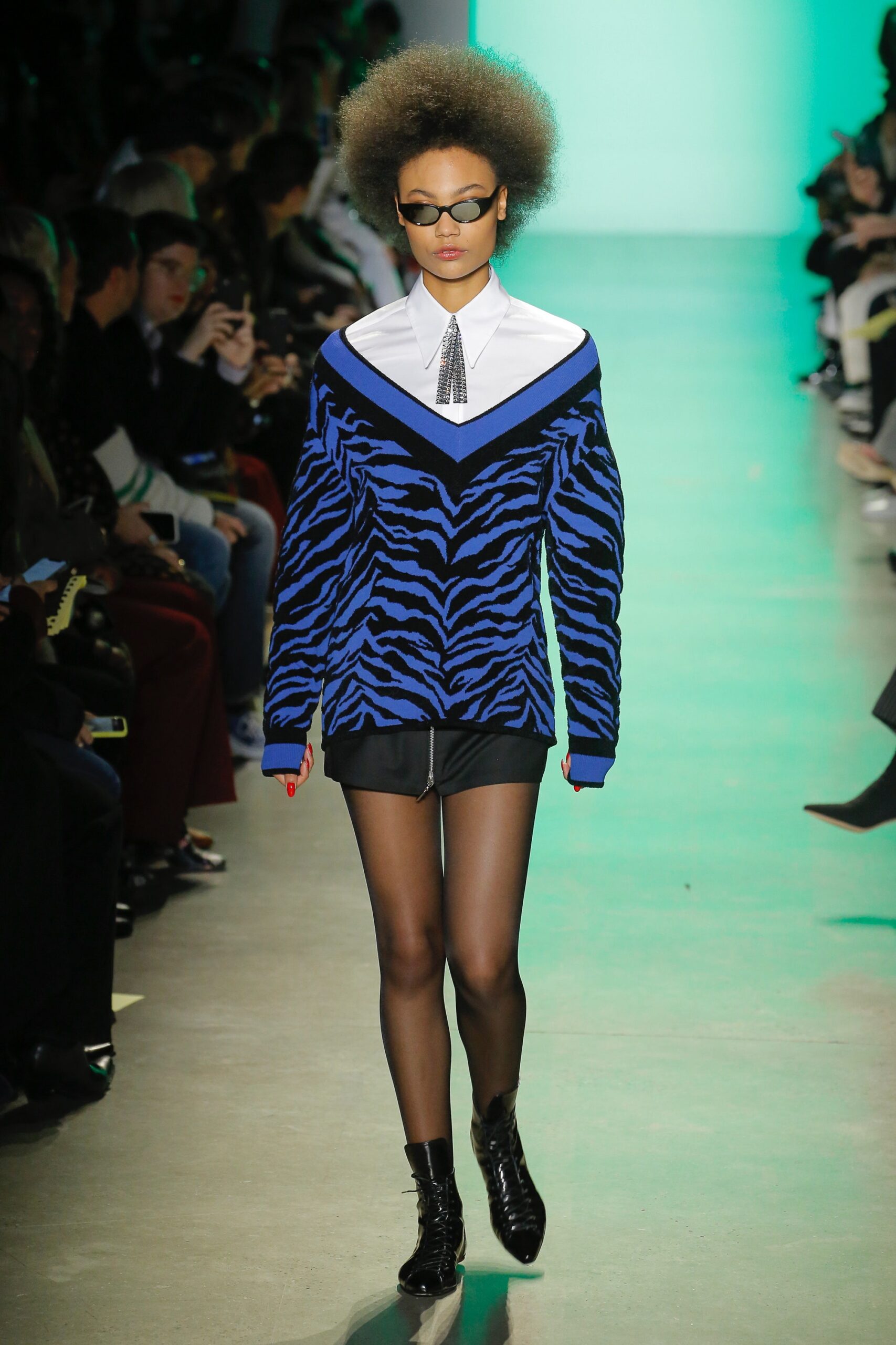 oversized blue striped sweater with black shorts