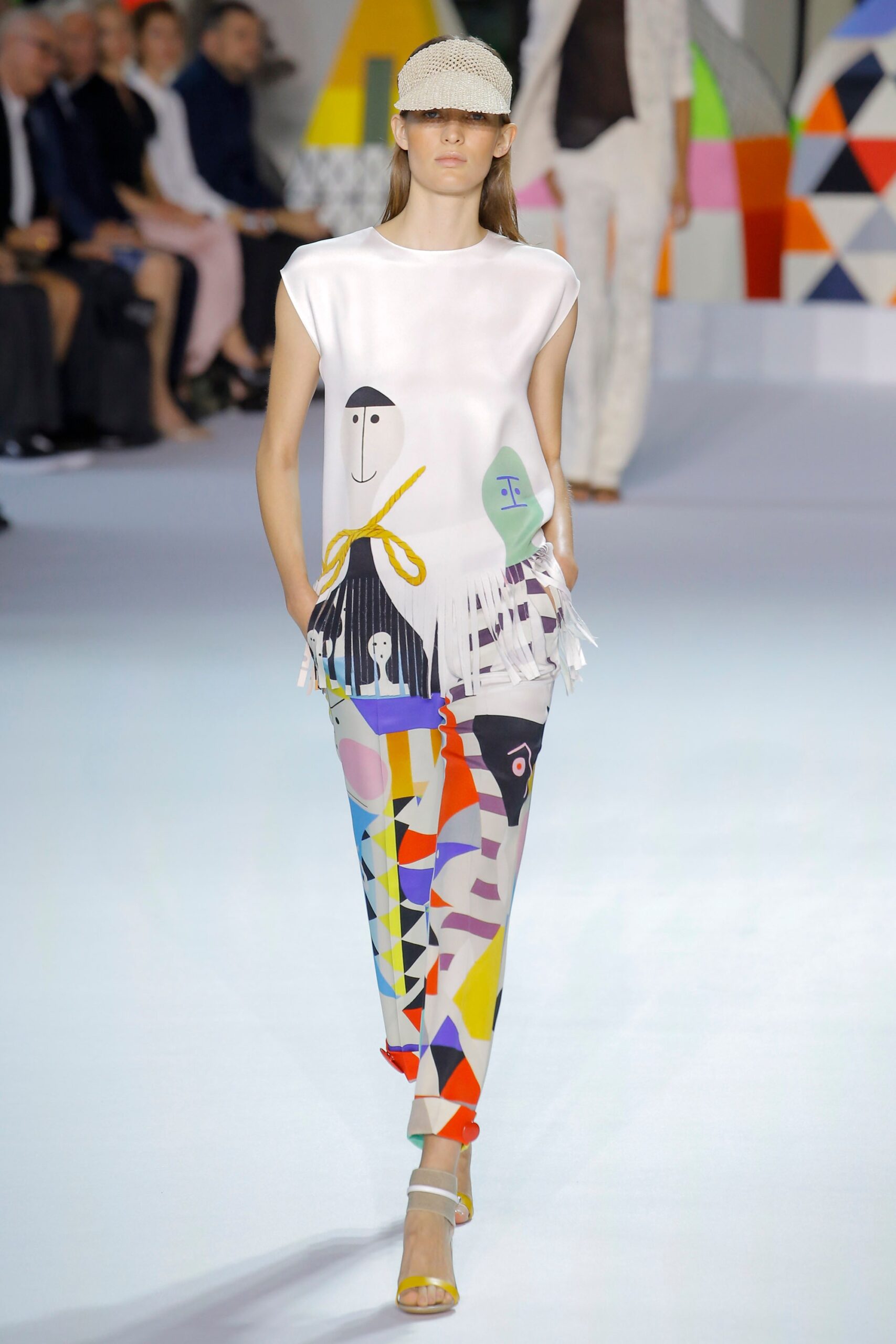 white relaxed top with printed pants