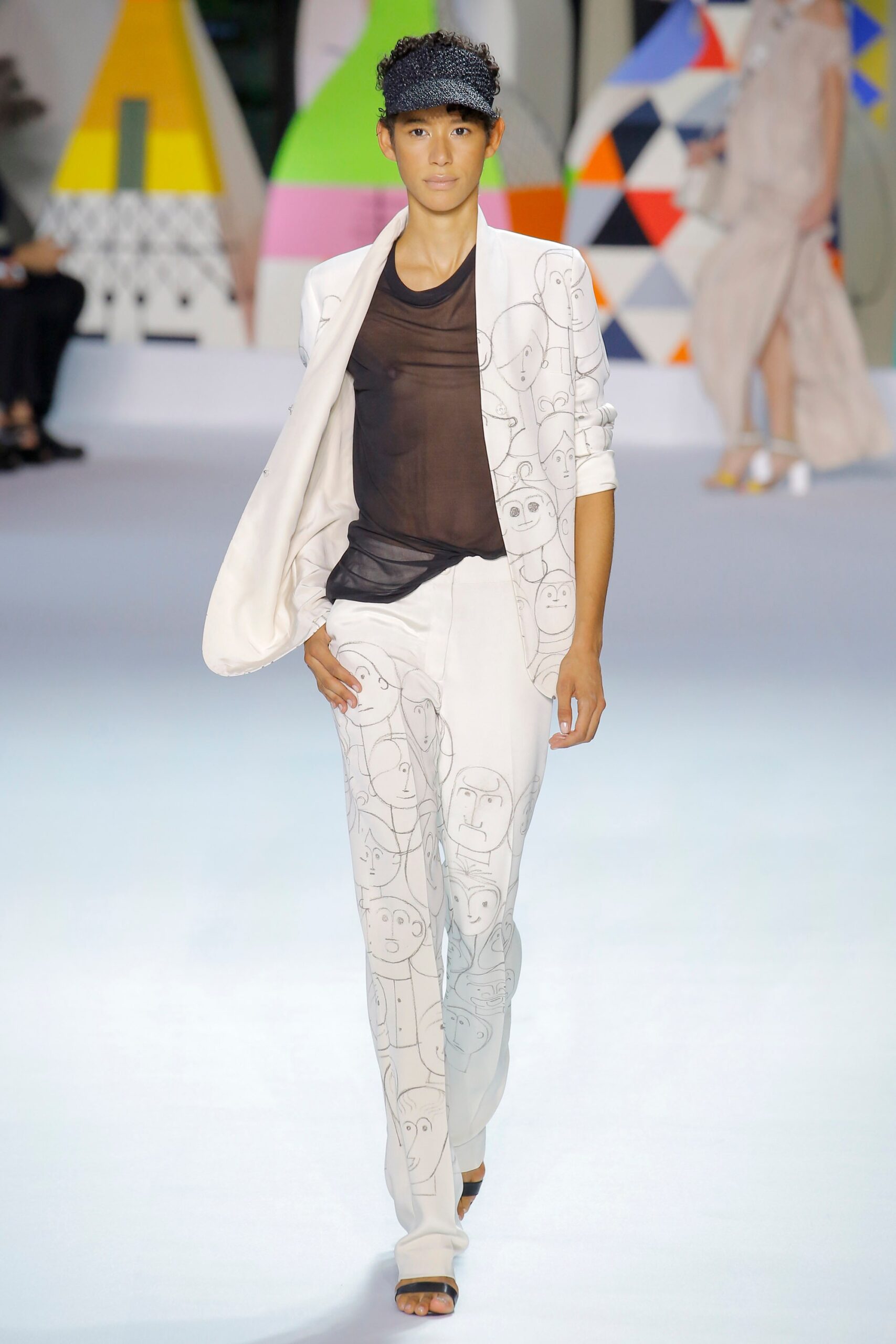 white tailored blazer with black sheer top
