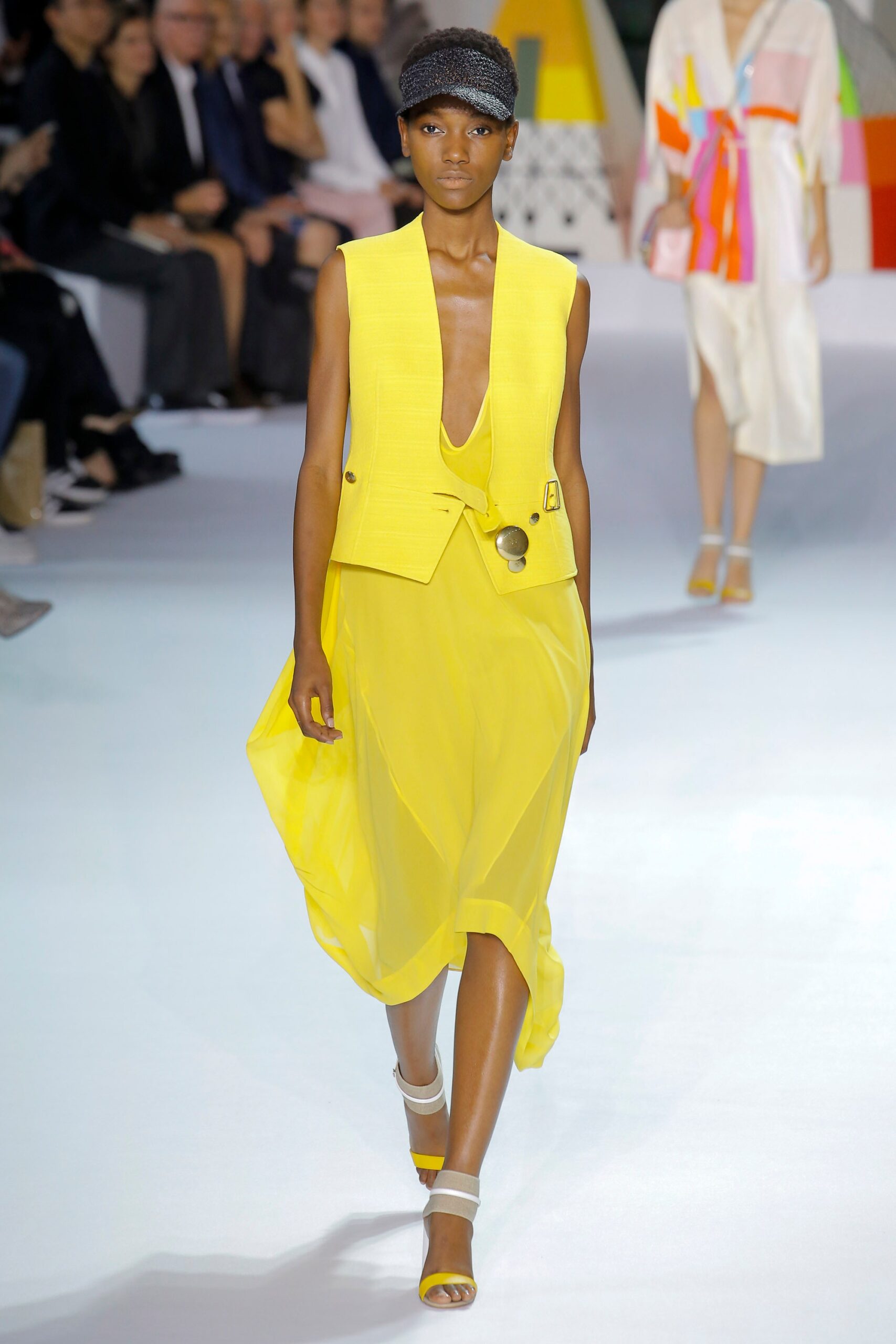 yellow cotton sleeveless v-neck fitted buttoned vest