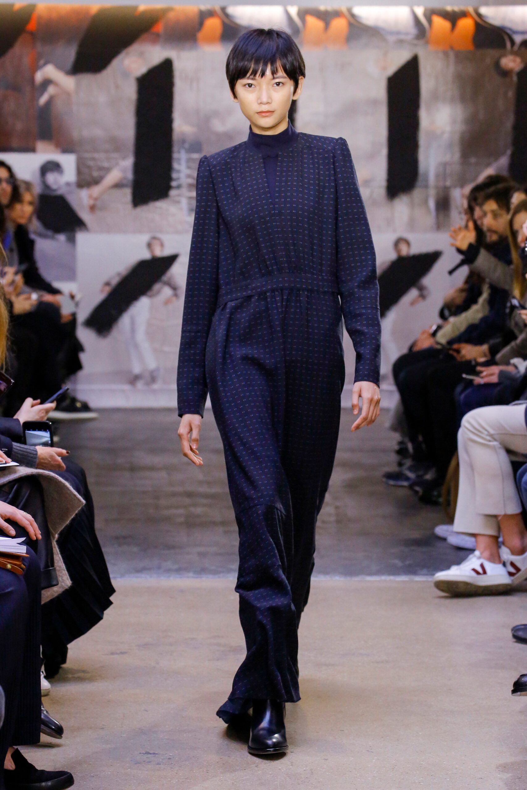 black fitted long-sleeve jumpsuit