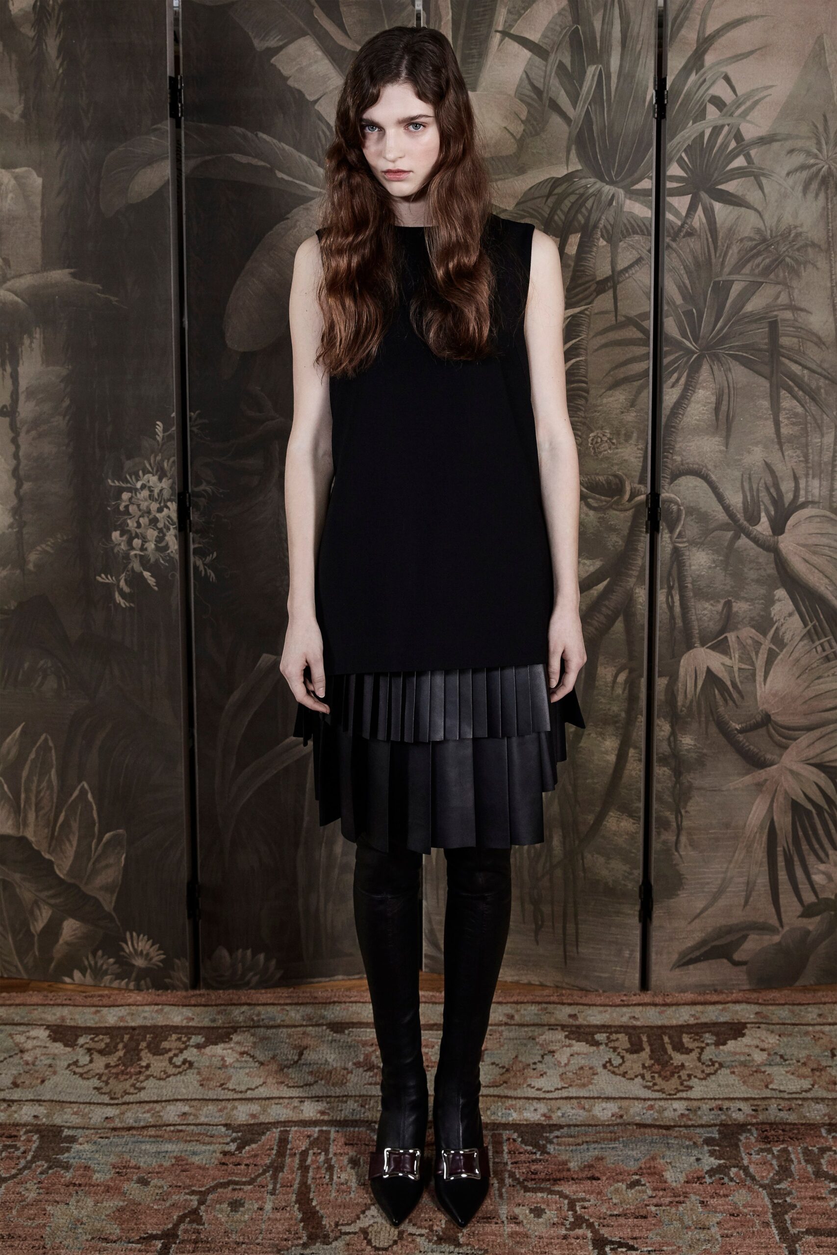 black pleated sleeveless dress