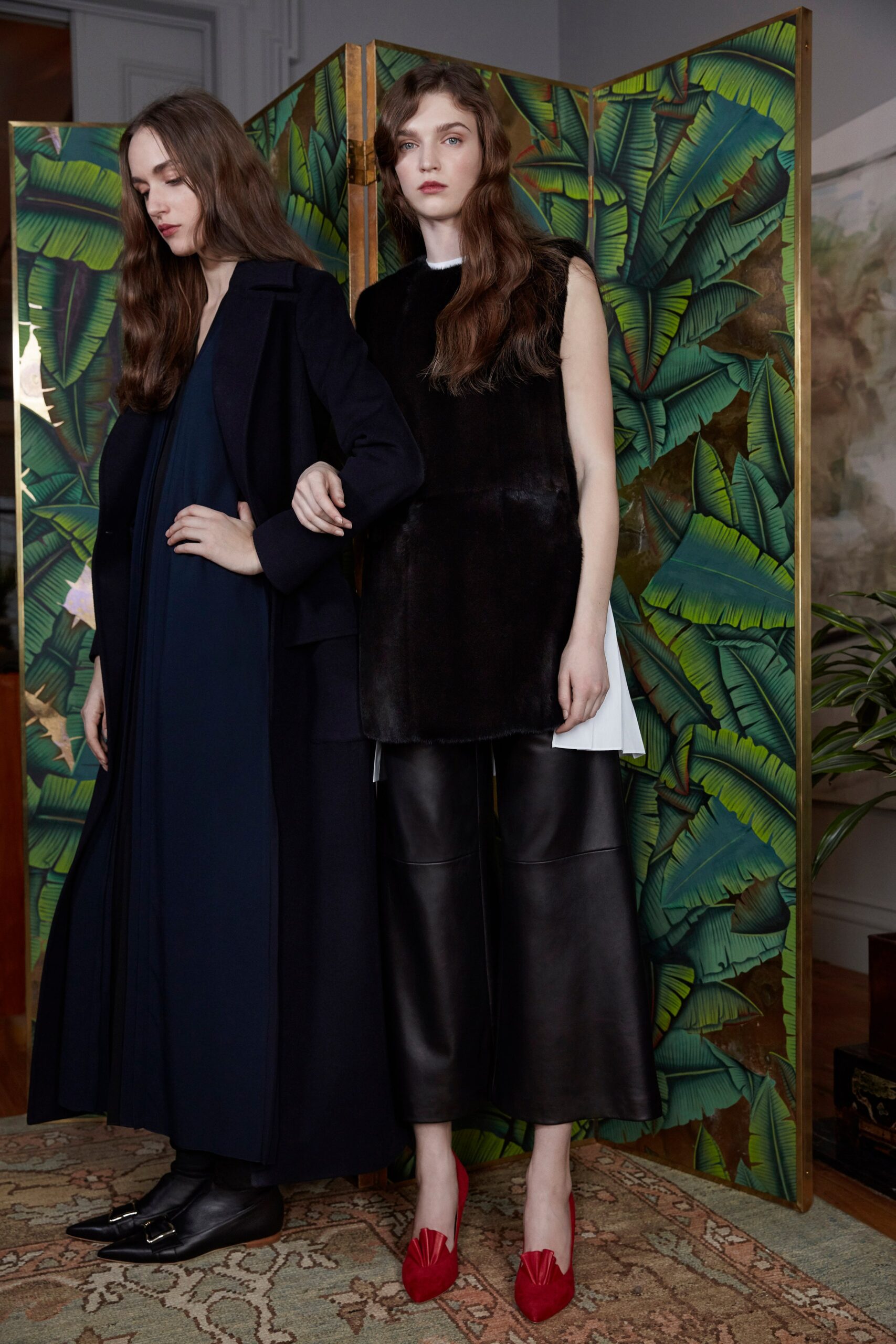 black fur sleeveless dress with leather pants