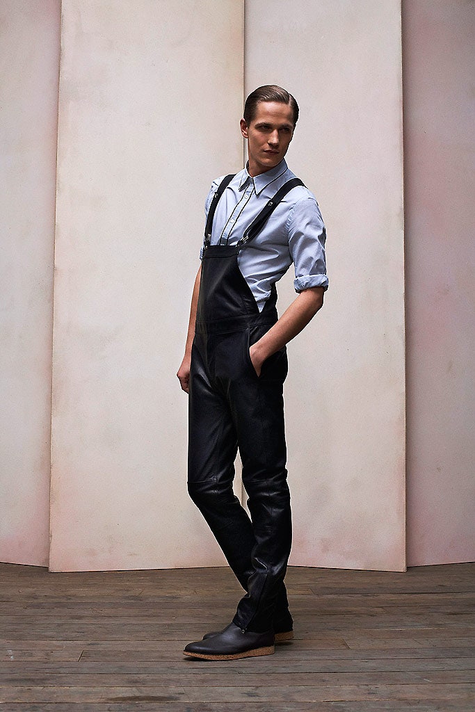 black leather overalls with white shirt