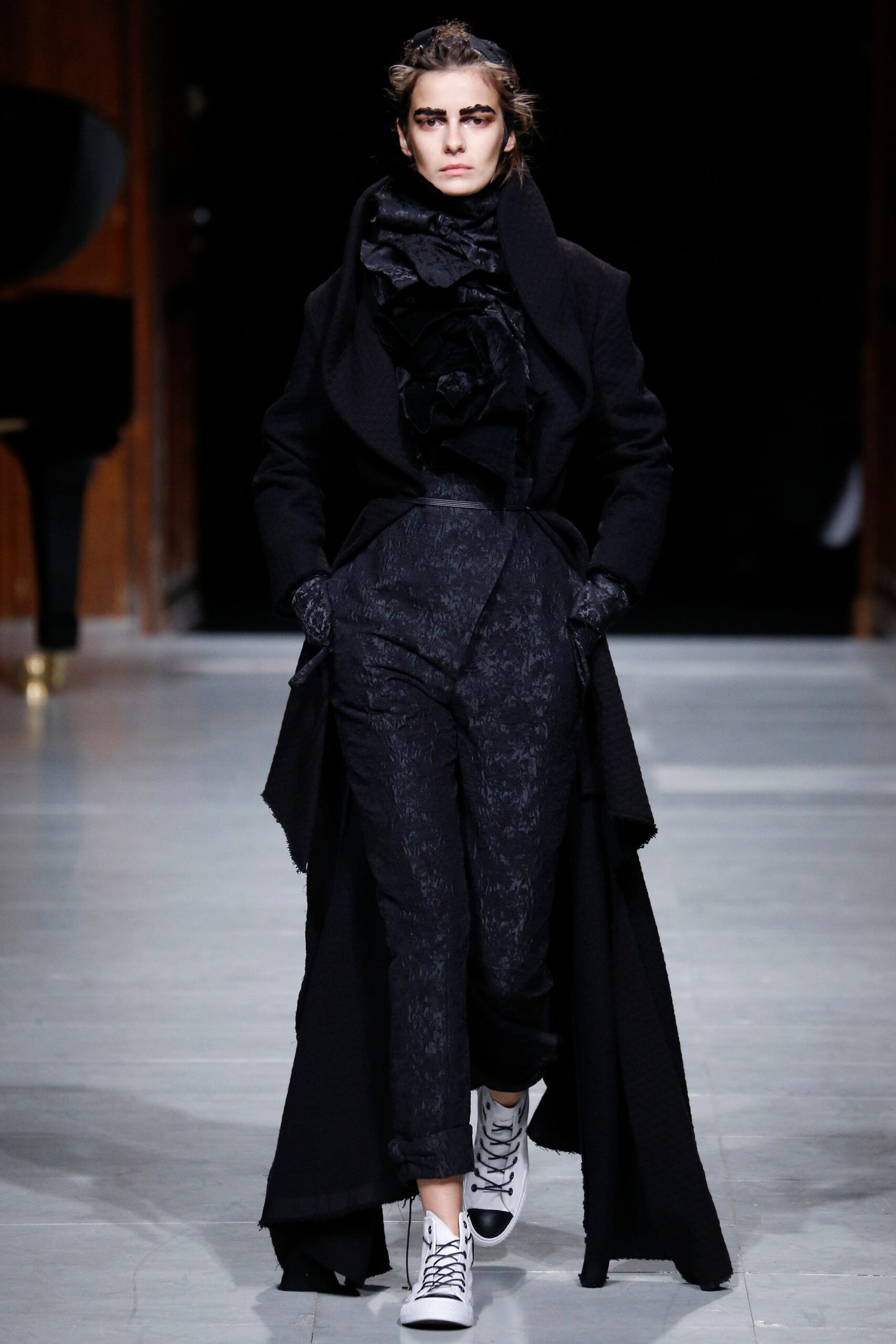 black wool coat with tailored pants