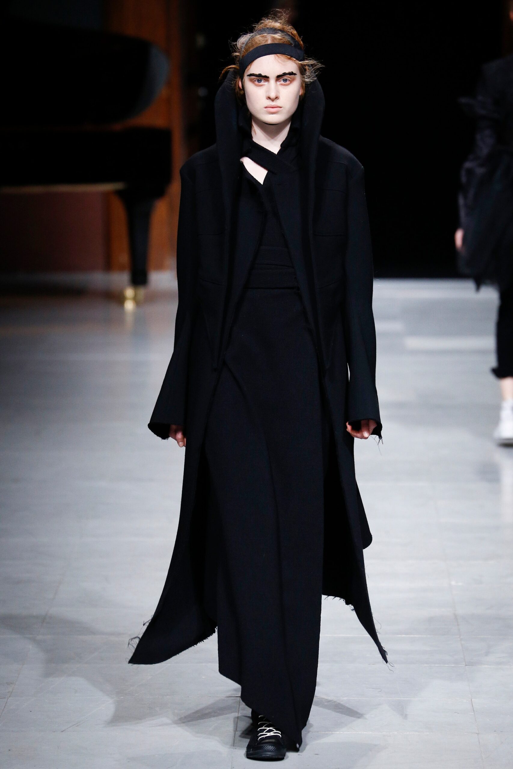 black wool coat and fitted dress