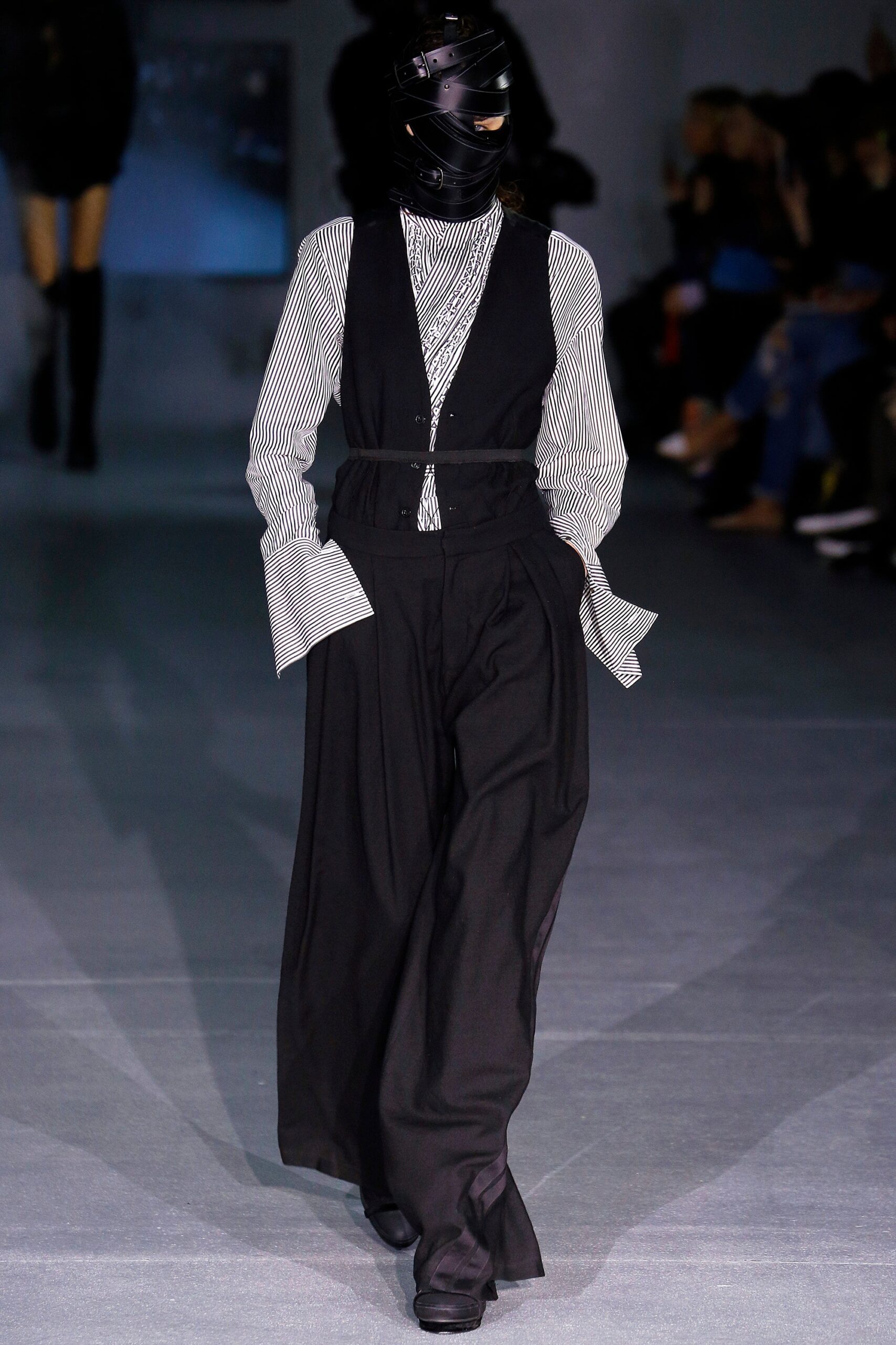 black vest white striped shirt wide-leg pants