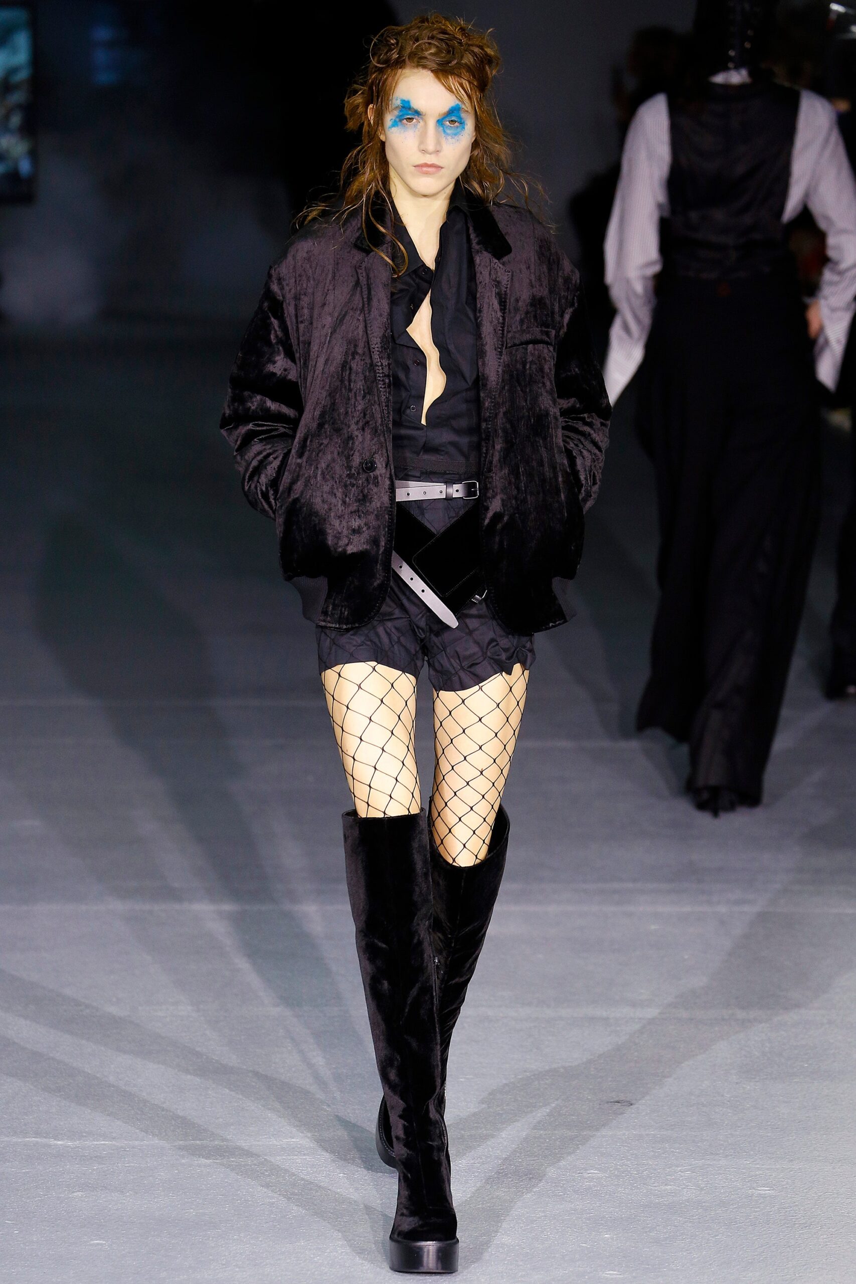 black faux-fur jacket with shorts