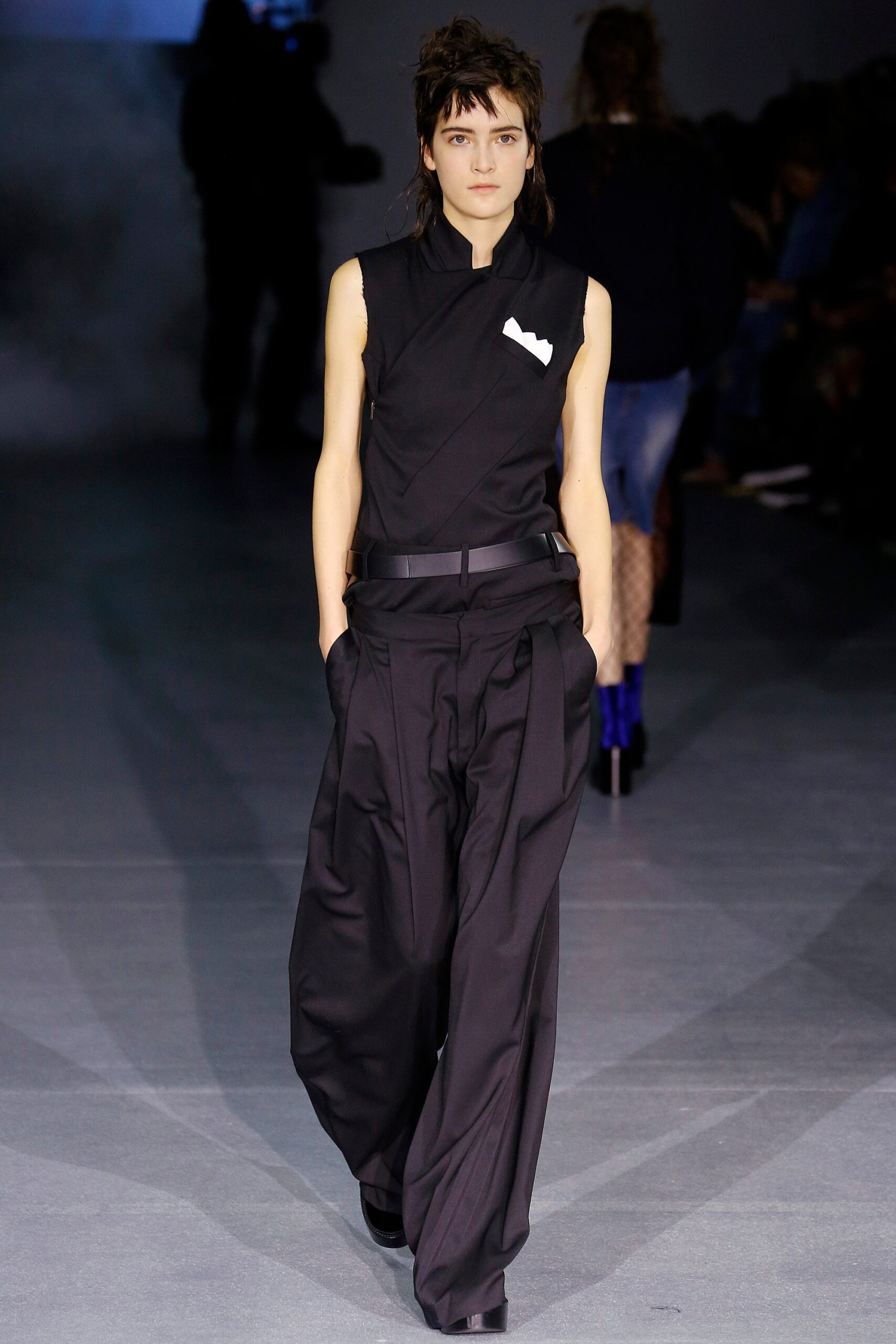 black fitted top and relaxed pants