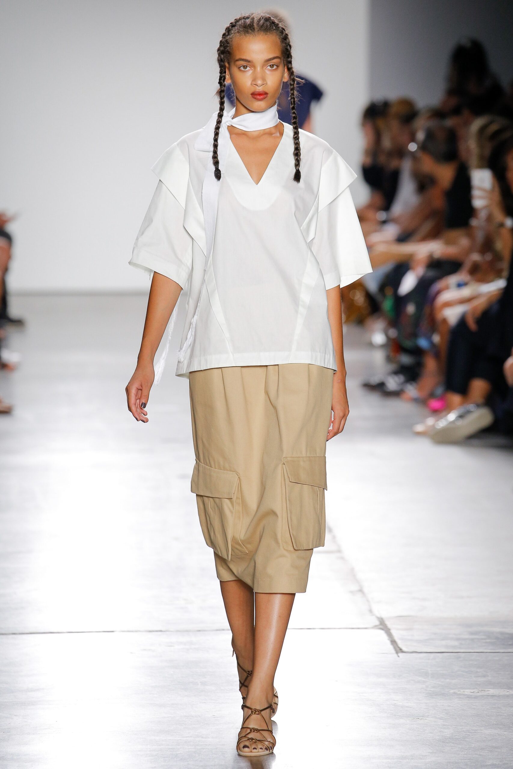 white relaxed top and beige cargo pants