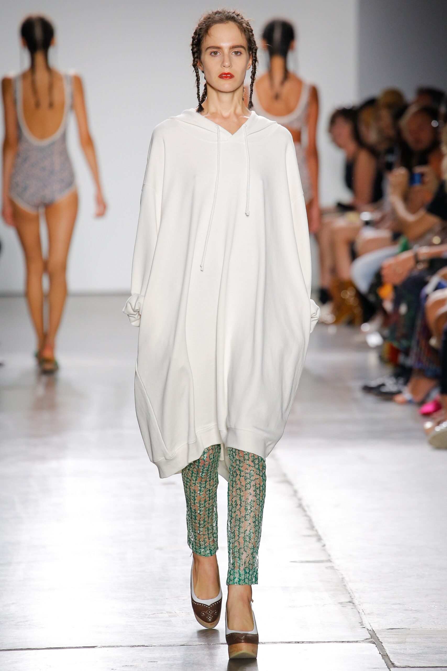 oversized white hoodie with printed green pants