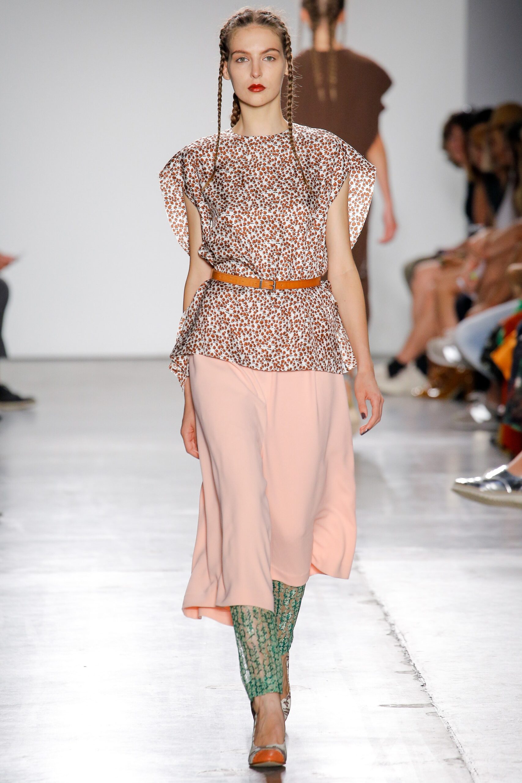 brown printed top with pink skirt