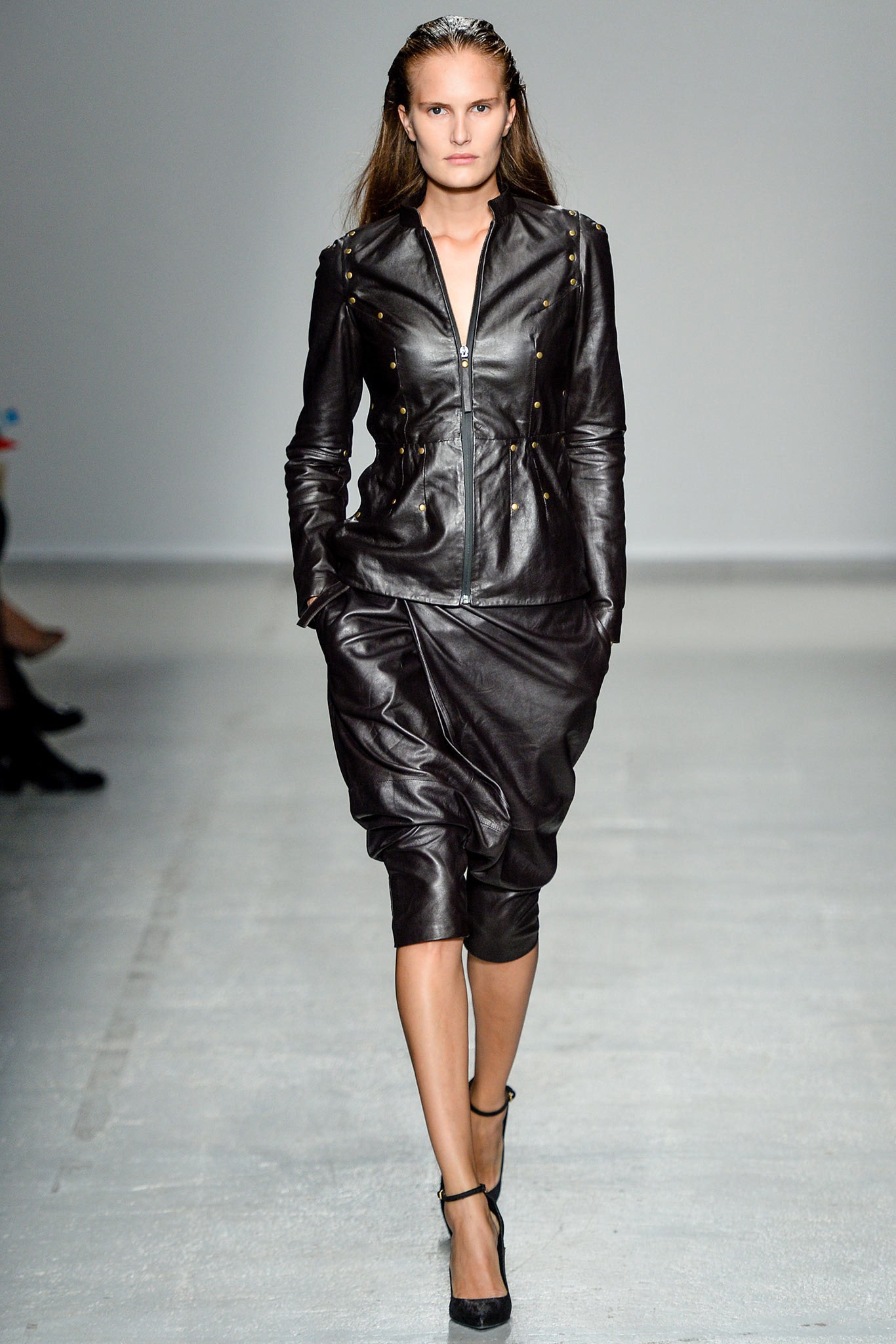 black leather long-sleeve collared fitted zippered buttoned jacket
