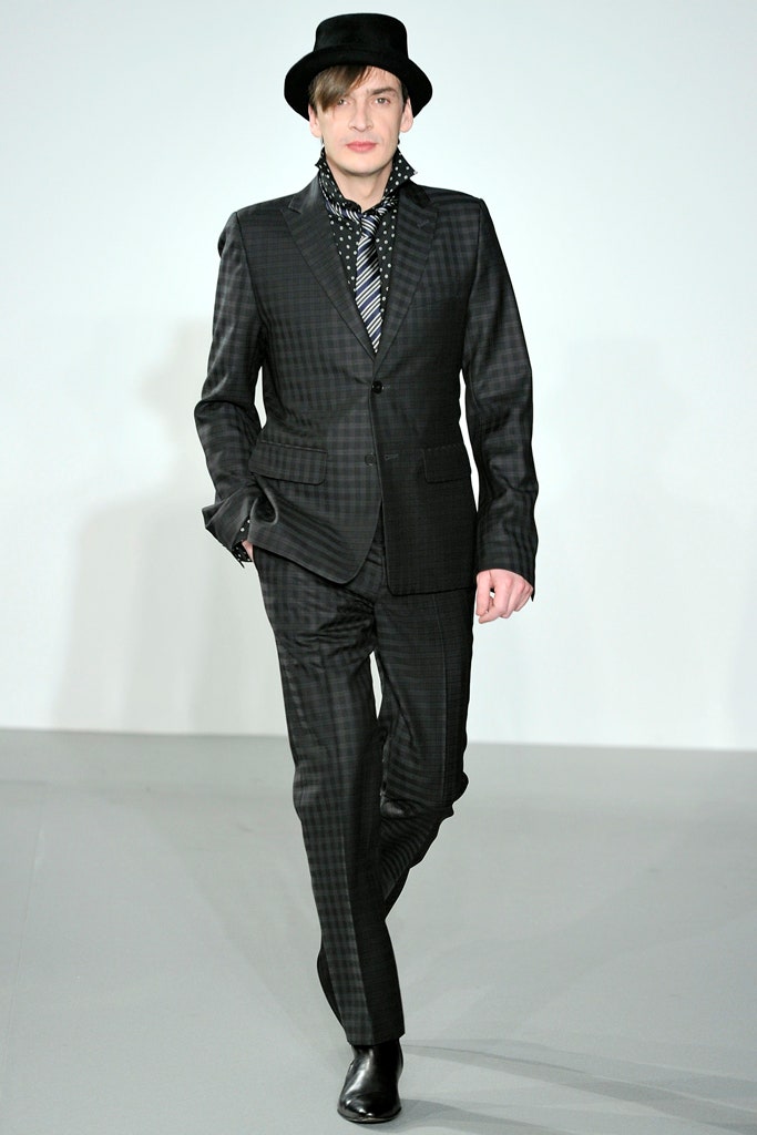 black and gray tailored suit