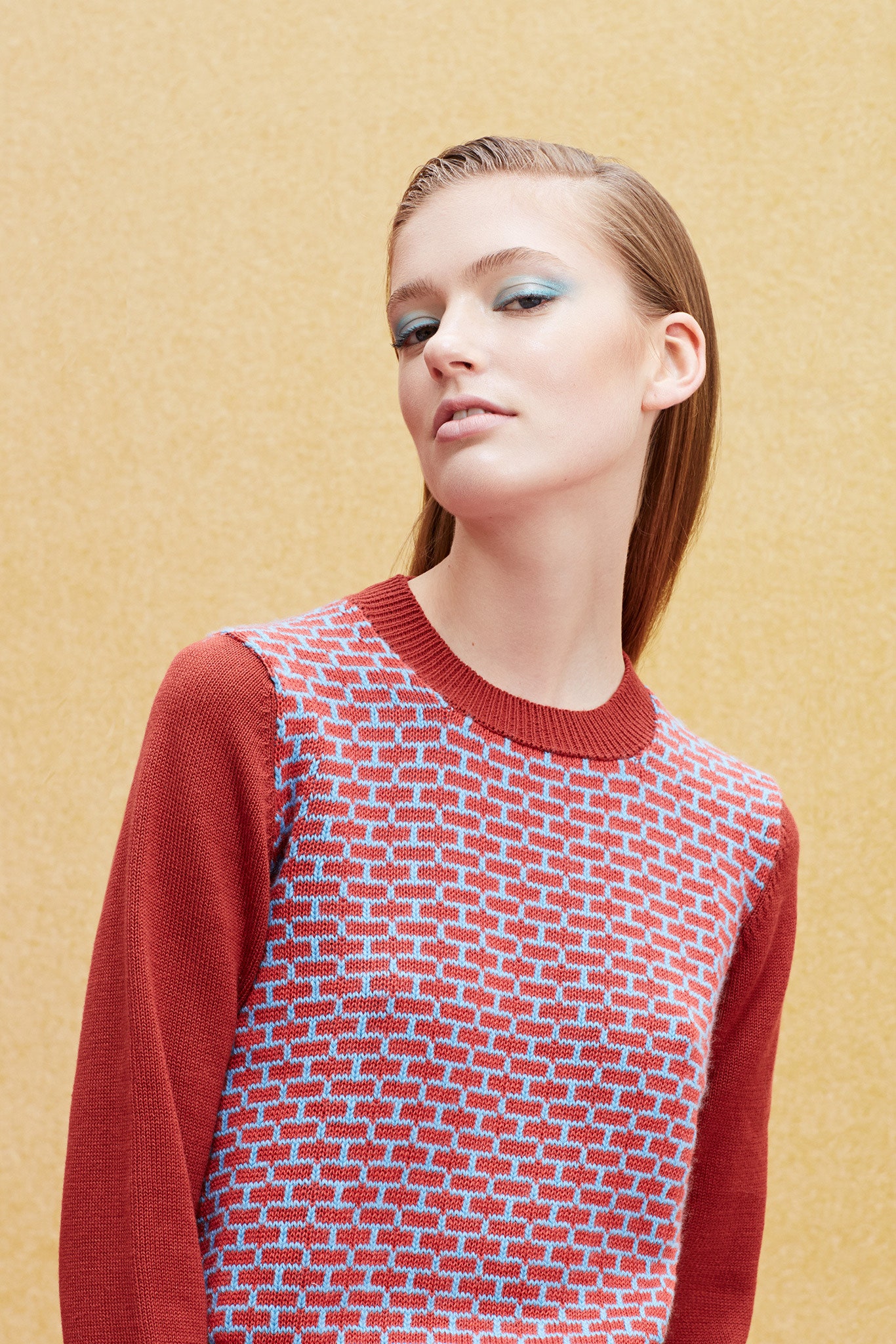 red and blue printed fitted sweater