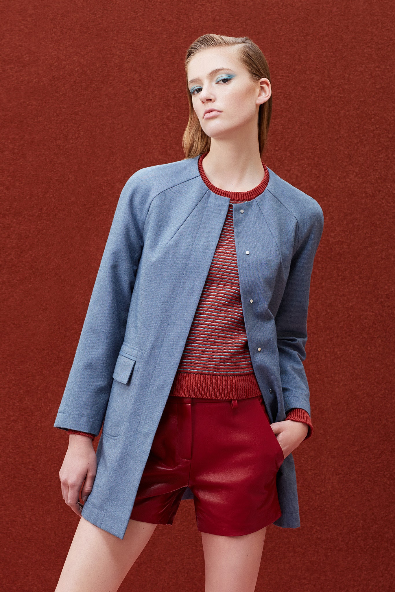 blue jacket red leather shorts