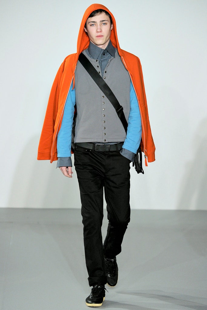 orange hoodie with gray shirt